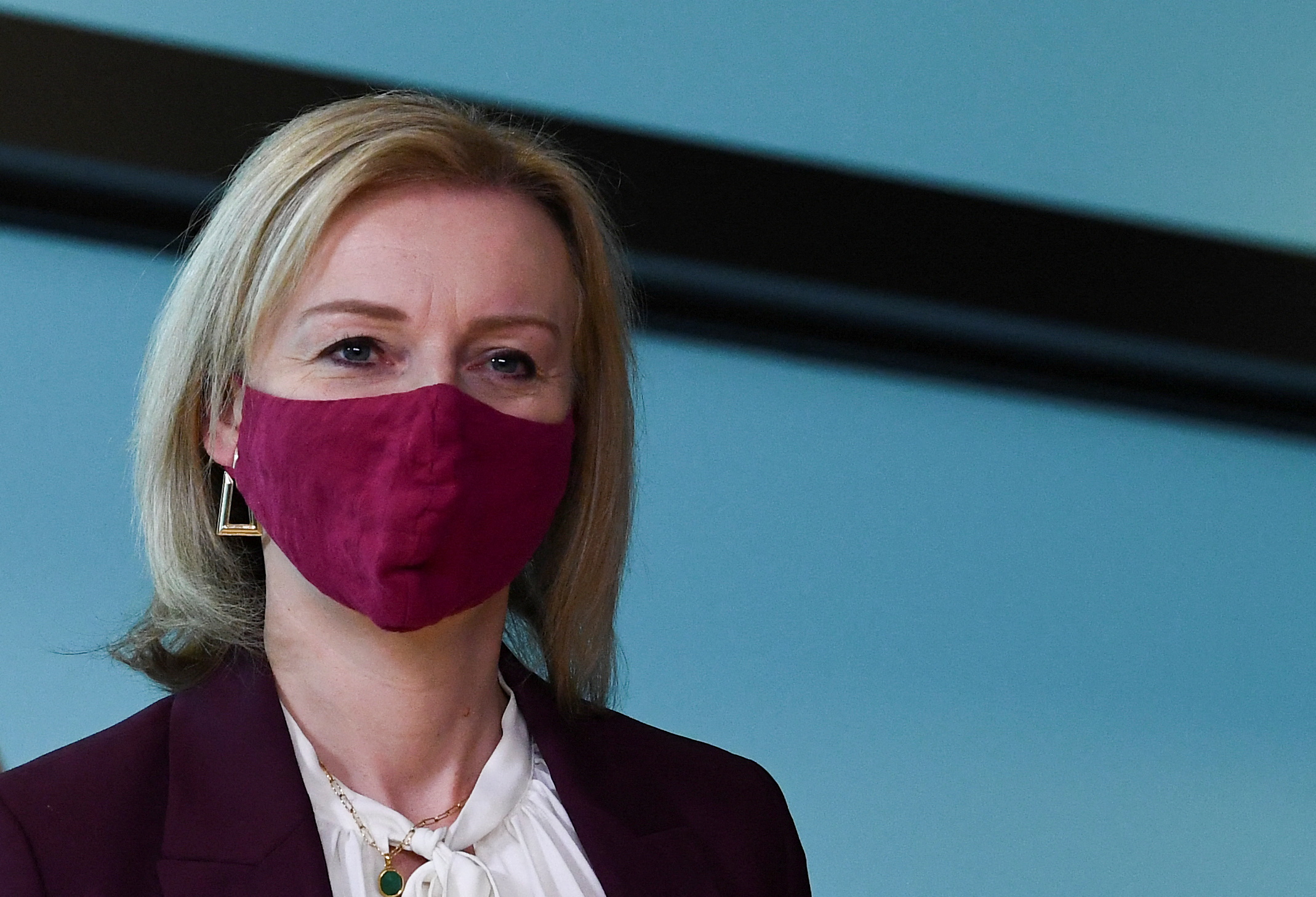 European Commission vice-president in charge for 'Interinstitutional Relations and Foresight' (unseen) welcomes British Foreign Secretary Liz Truss (L) before their bilateral meeting at the EU headquarters on January 24, 2022 in Brussels
