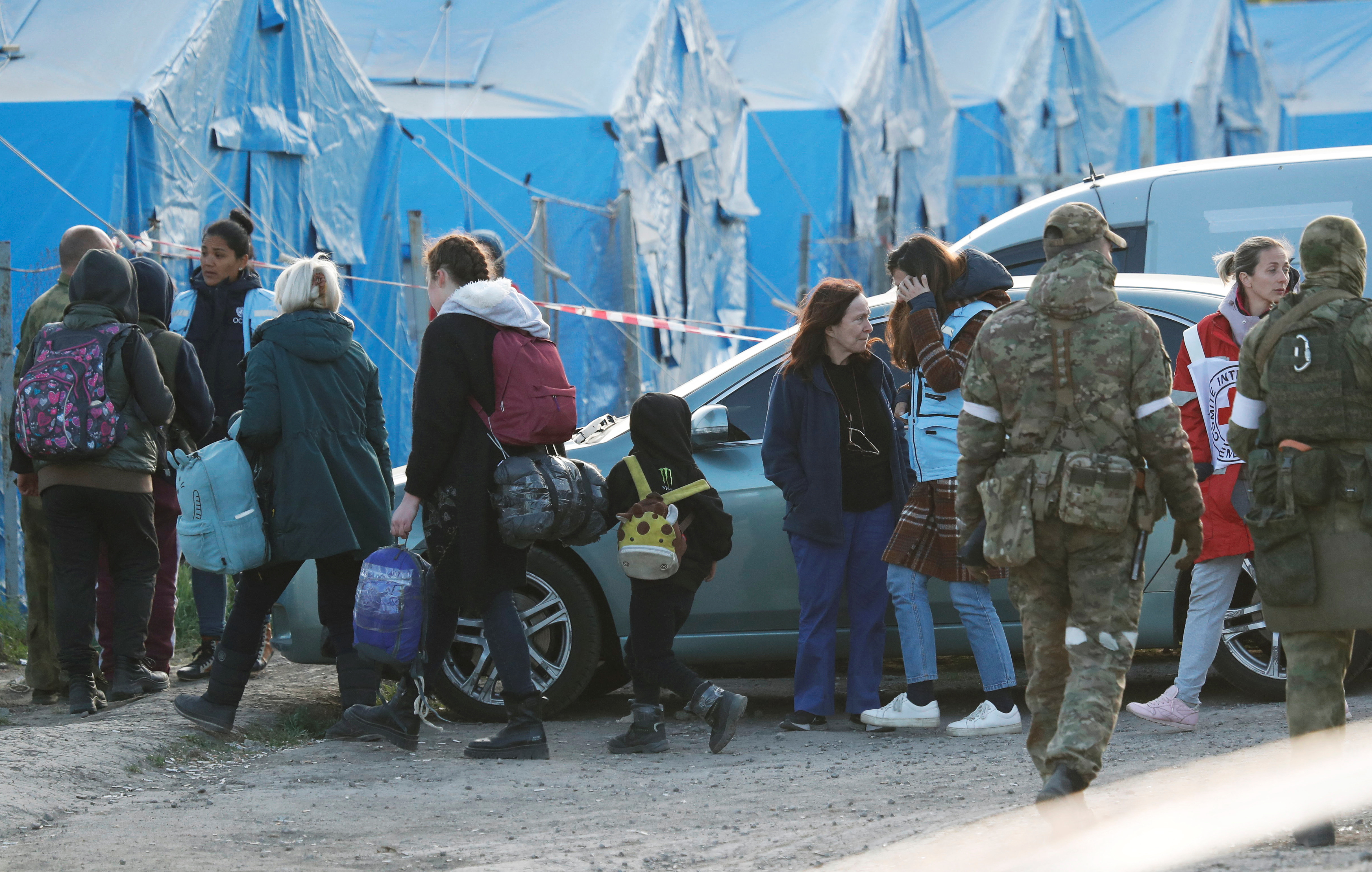 Evacuees from Azovstal steel plant arrive at a temporary accommodation centre in Bezimenne