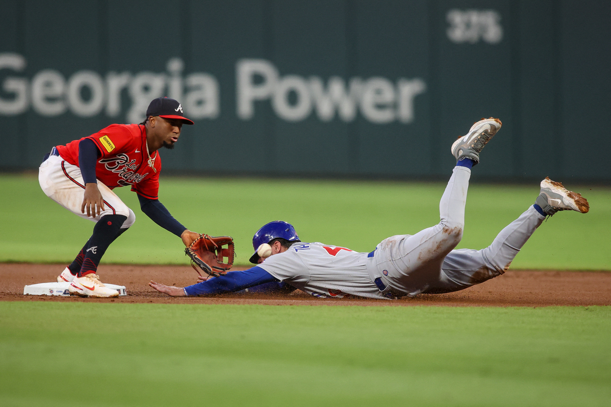 Matt Olson of the Atlanta Braves hits a RBI single in the first