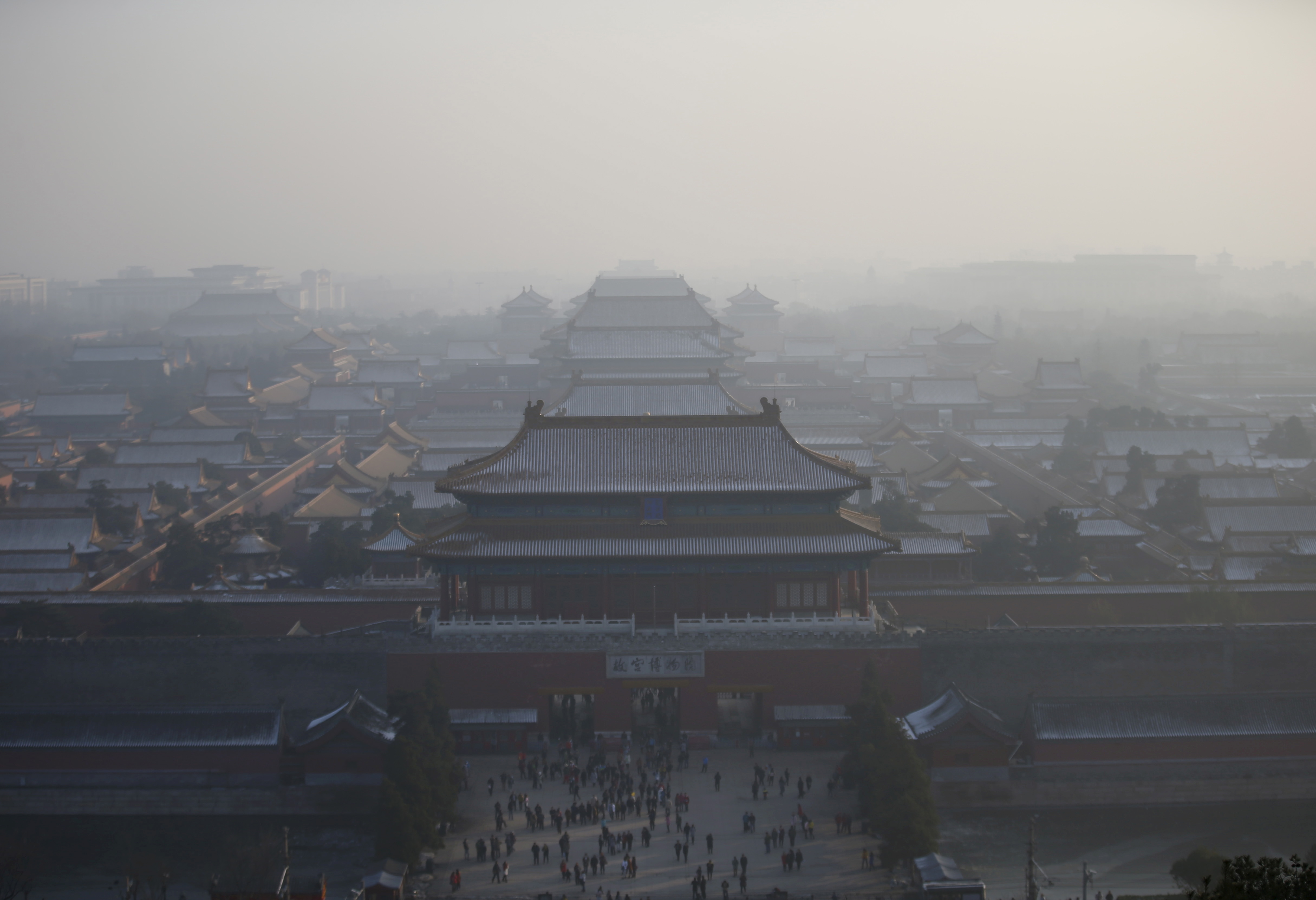 The Forbidden City is seen from the top of Jingshan Park during a heavily polluted day in Beijing
