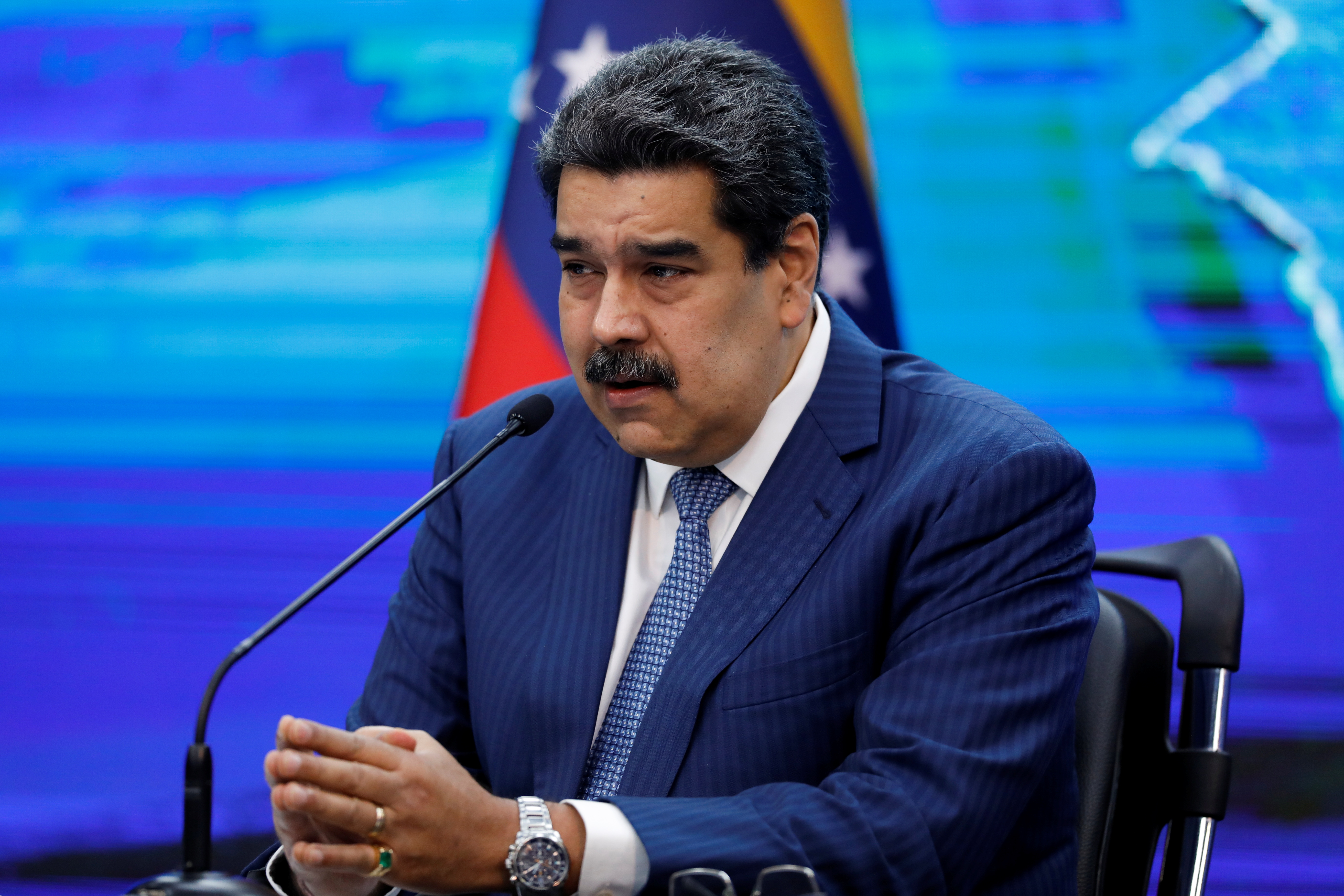 Venezuela's President Maduro addresses the media in Caracas