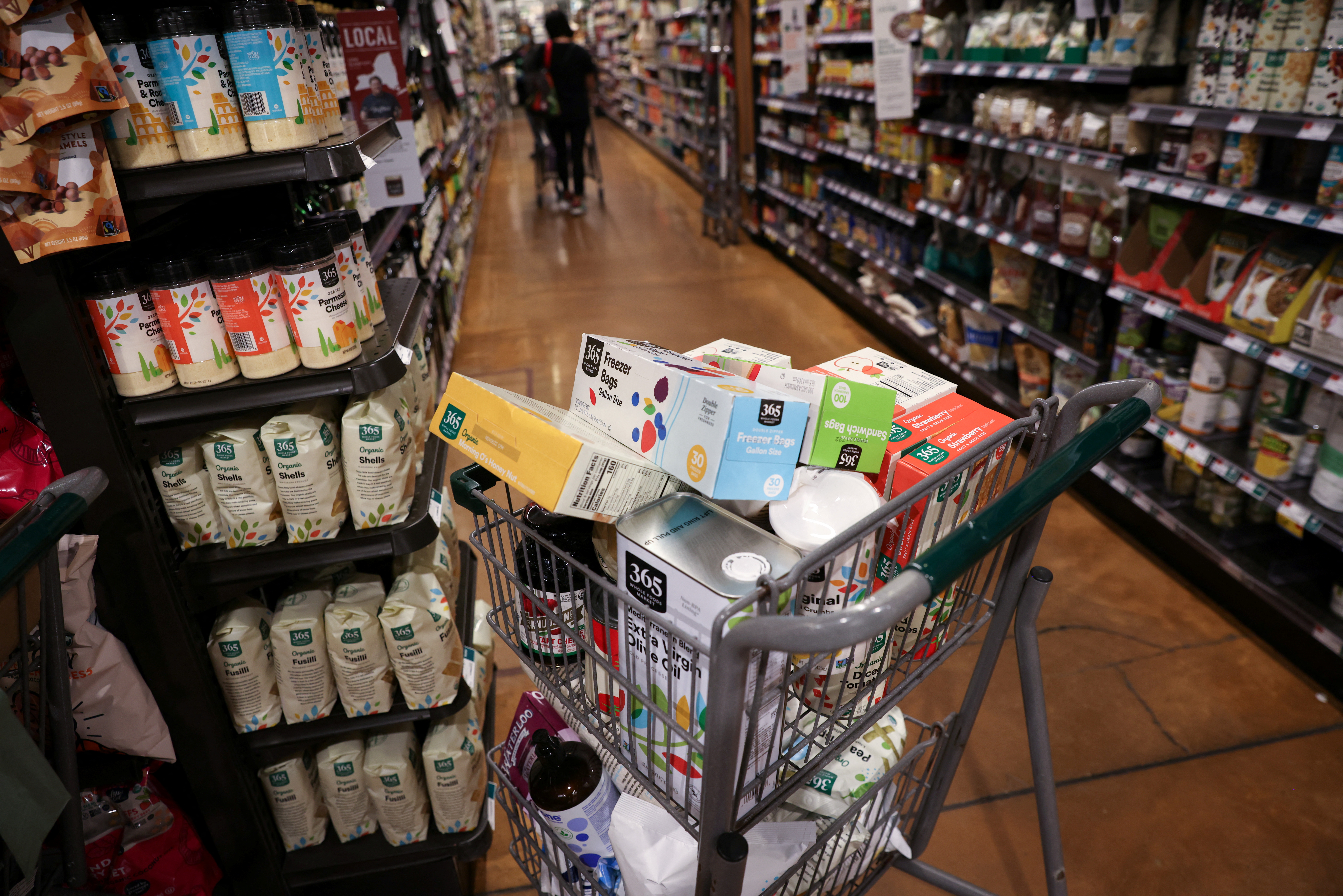 A shopping cart is seen in a supermarket as inflation affects prices for shoppers in Manhattan, New York City