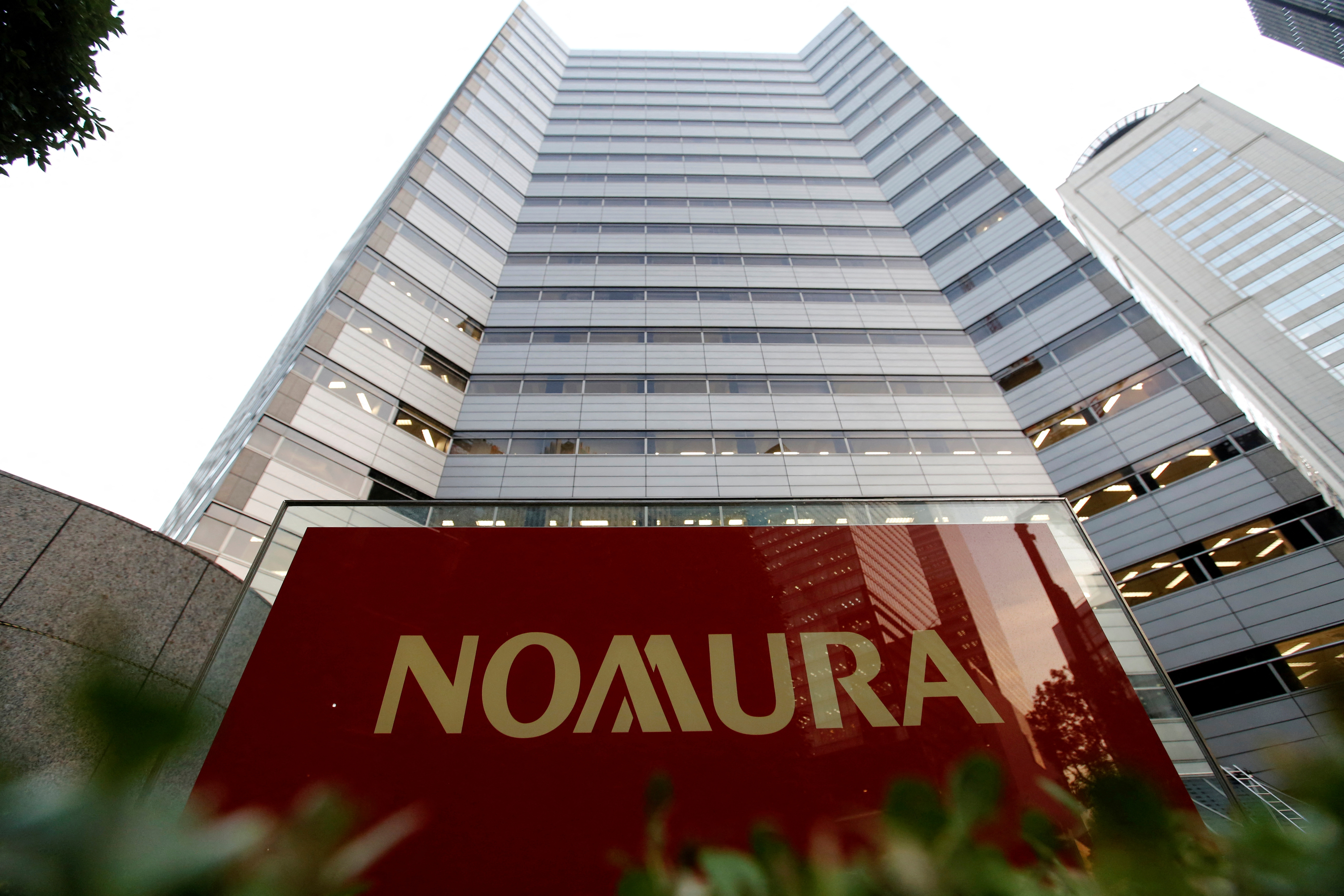 Logo of Nomura Securities is pictured at the company's Otemachi Head Office in Tokyo
