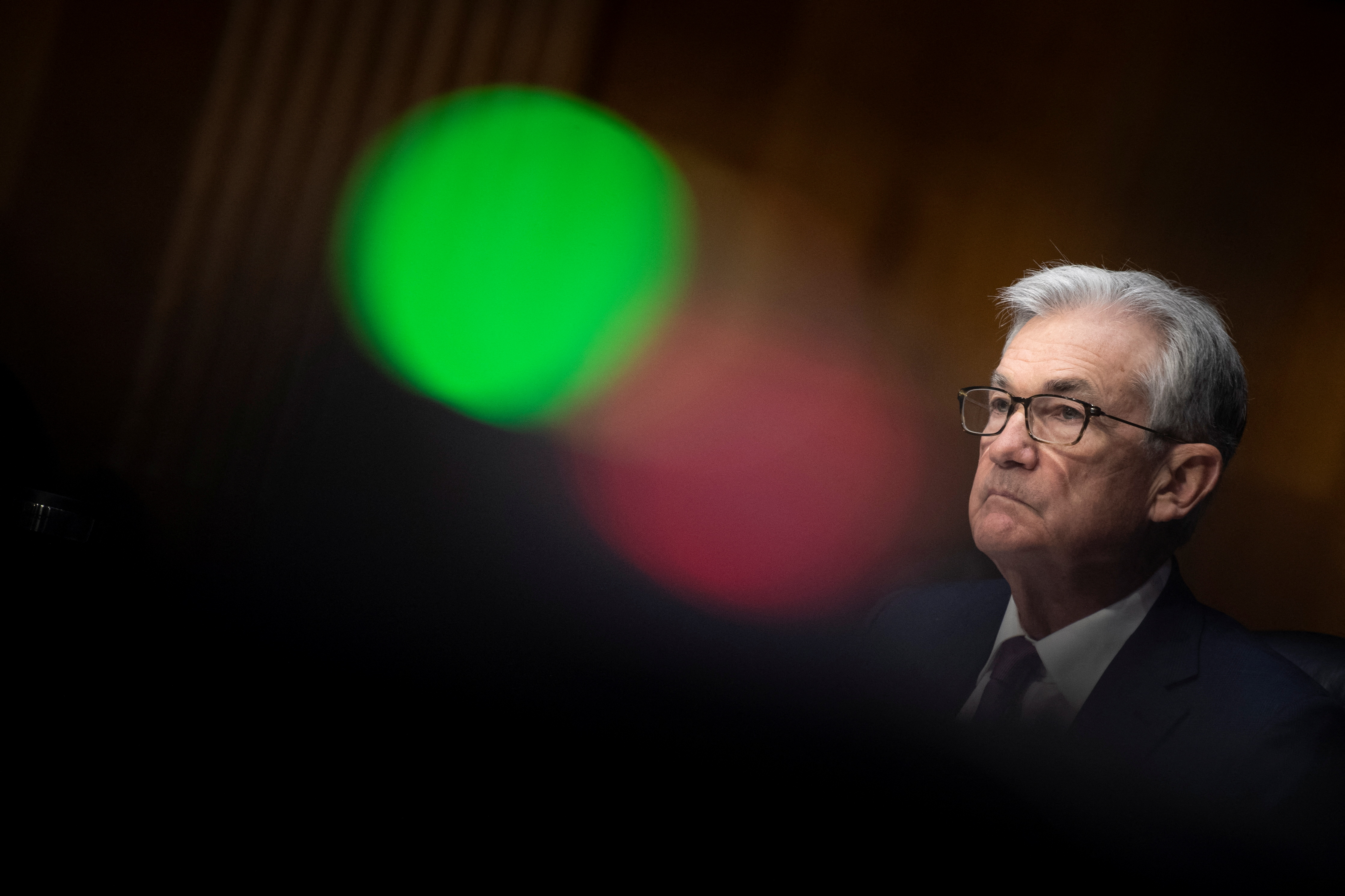 U.S. Federal Reserve Board Chairman Jerome Powell listens during his re-nominations hearing of the Senate Banking, Housing and Urban Affairs Committee on Capitol Hill,  in Washington, U.S., January 11, 2022. Brendan Smialowski/Pool via REUTERS
