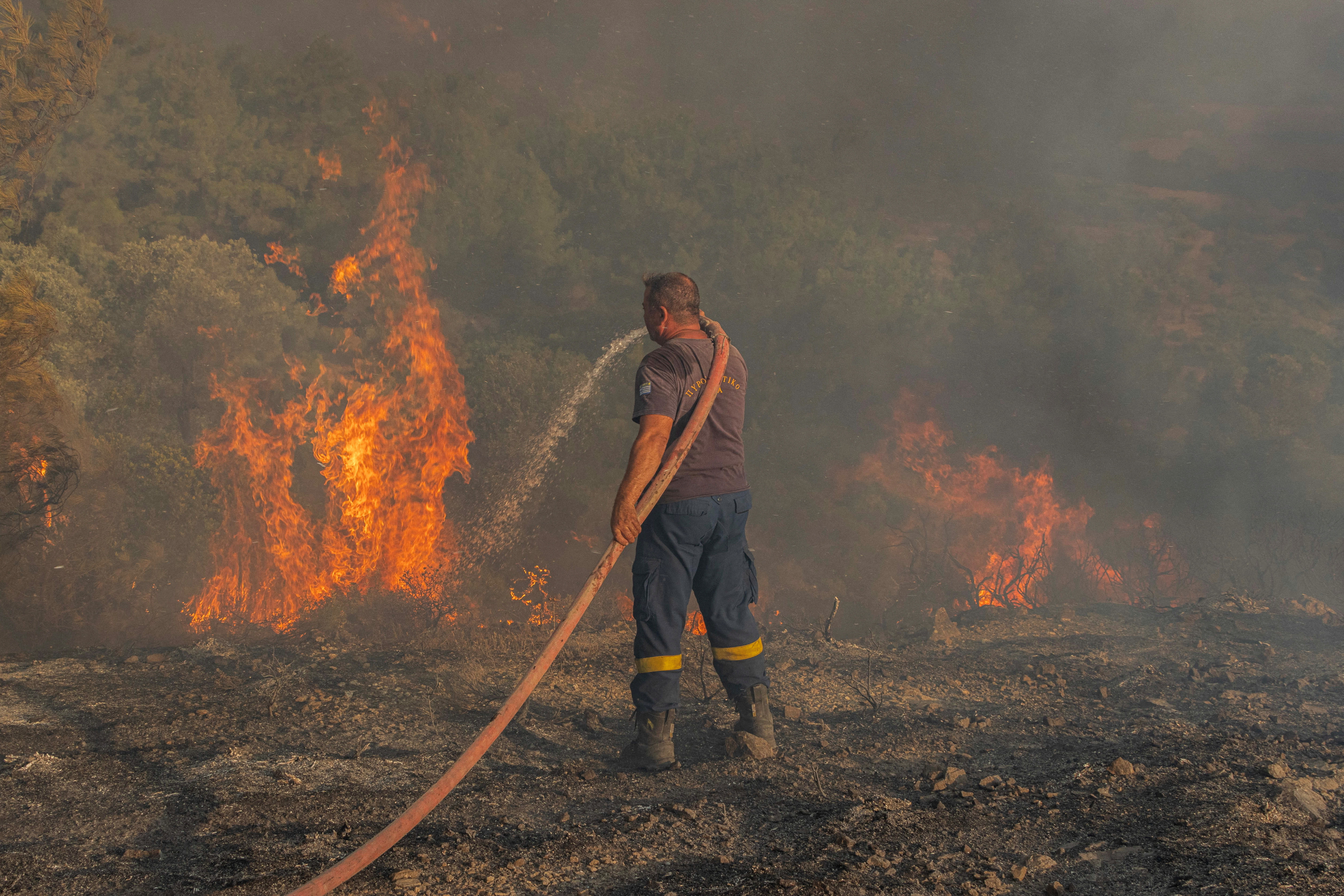 In pictures: Fires burn out of control on Greek island of Rhodes 