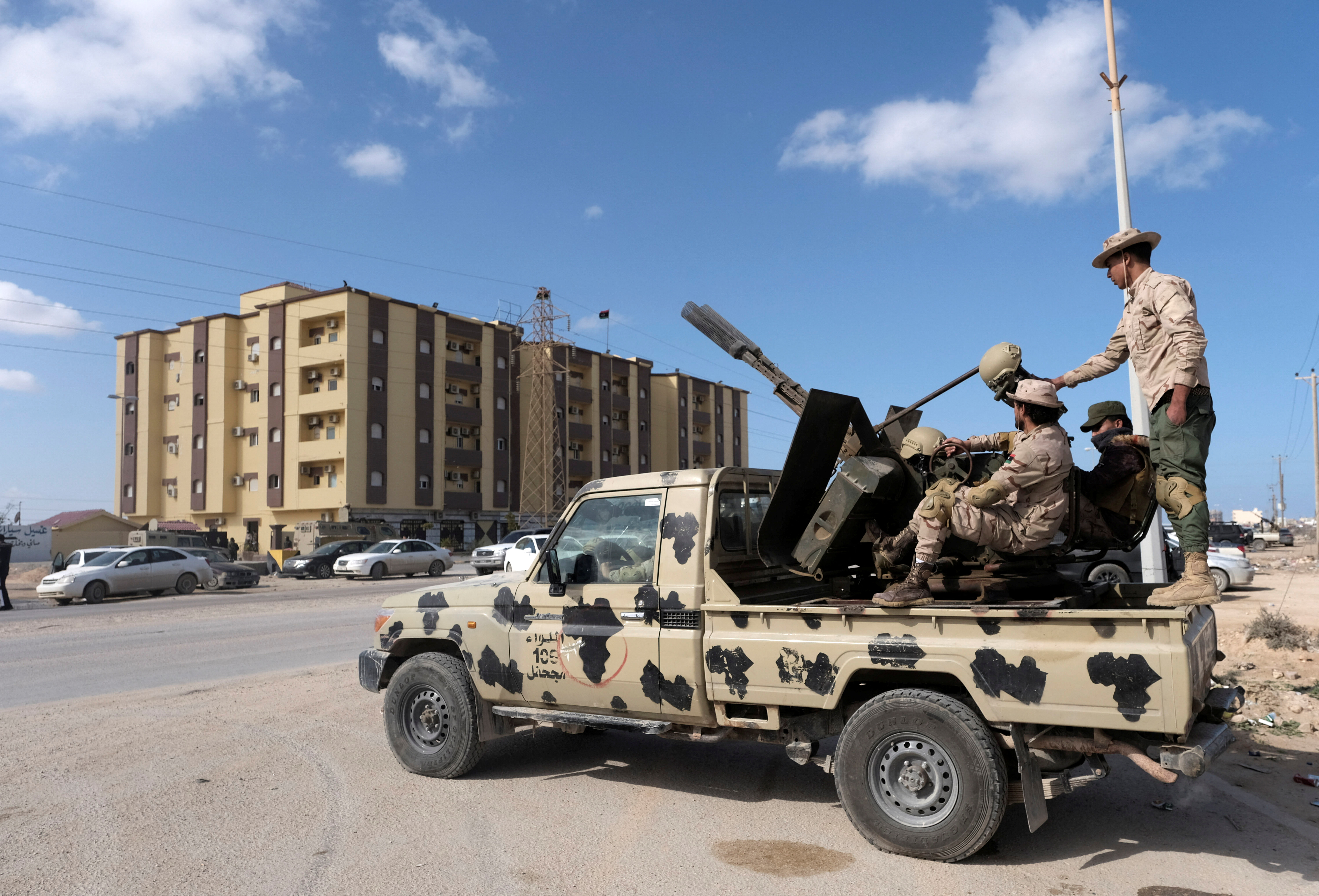 Security forces stand guard outside the Parliament building in Tobruk, Libya