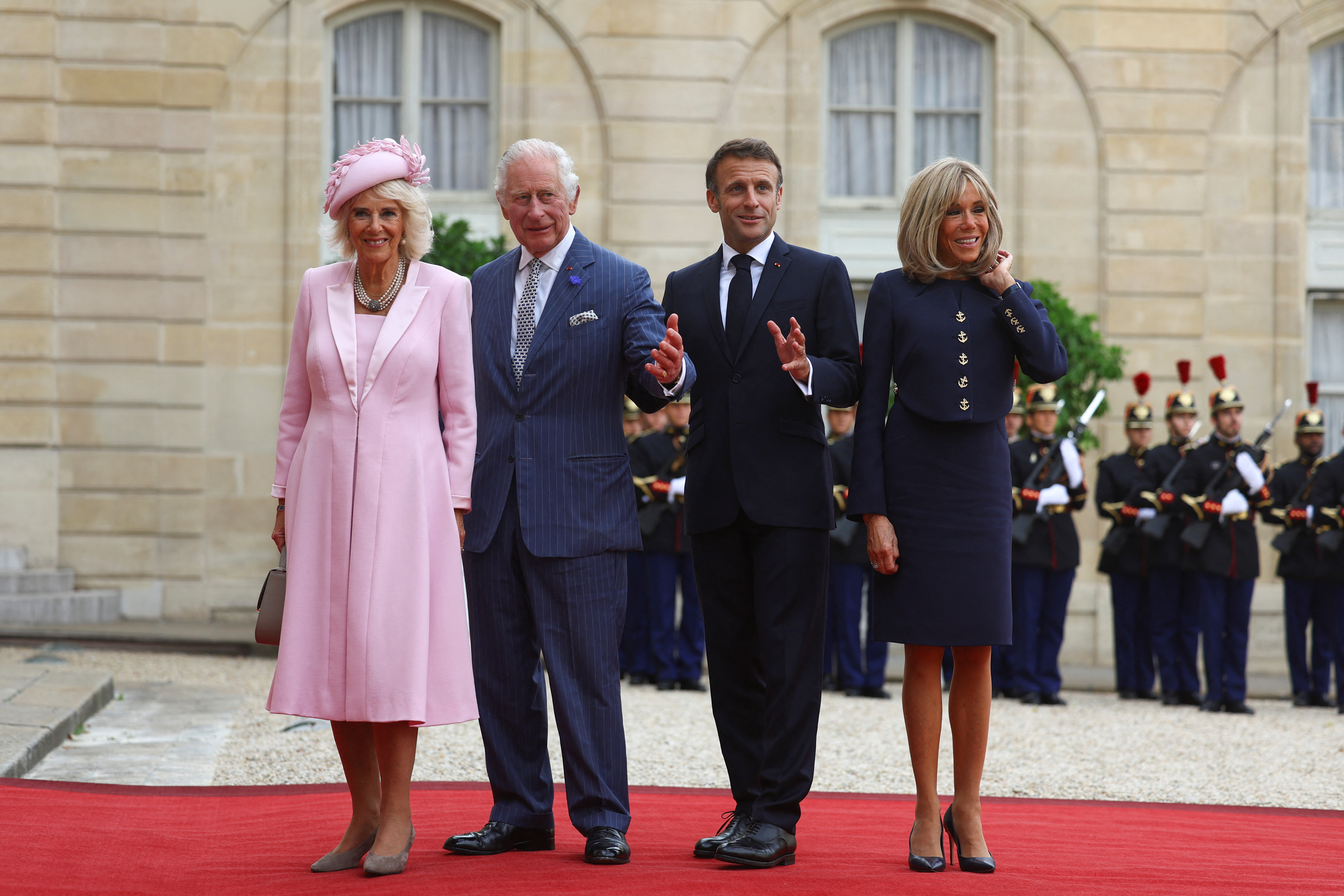 LVMH CEO Bernard Arnault and his wife arrive at the Elysee Palace