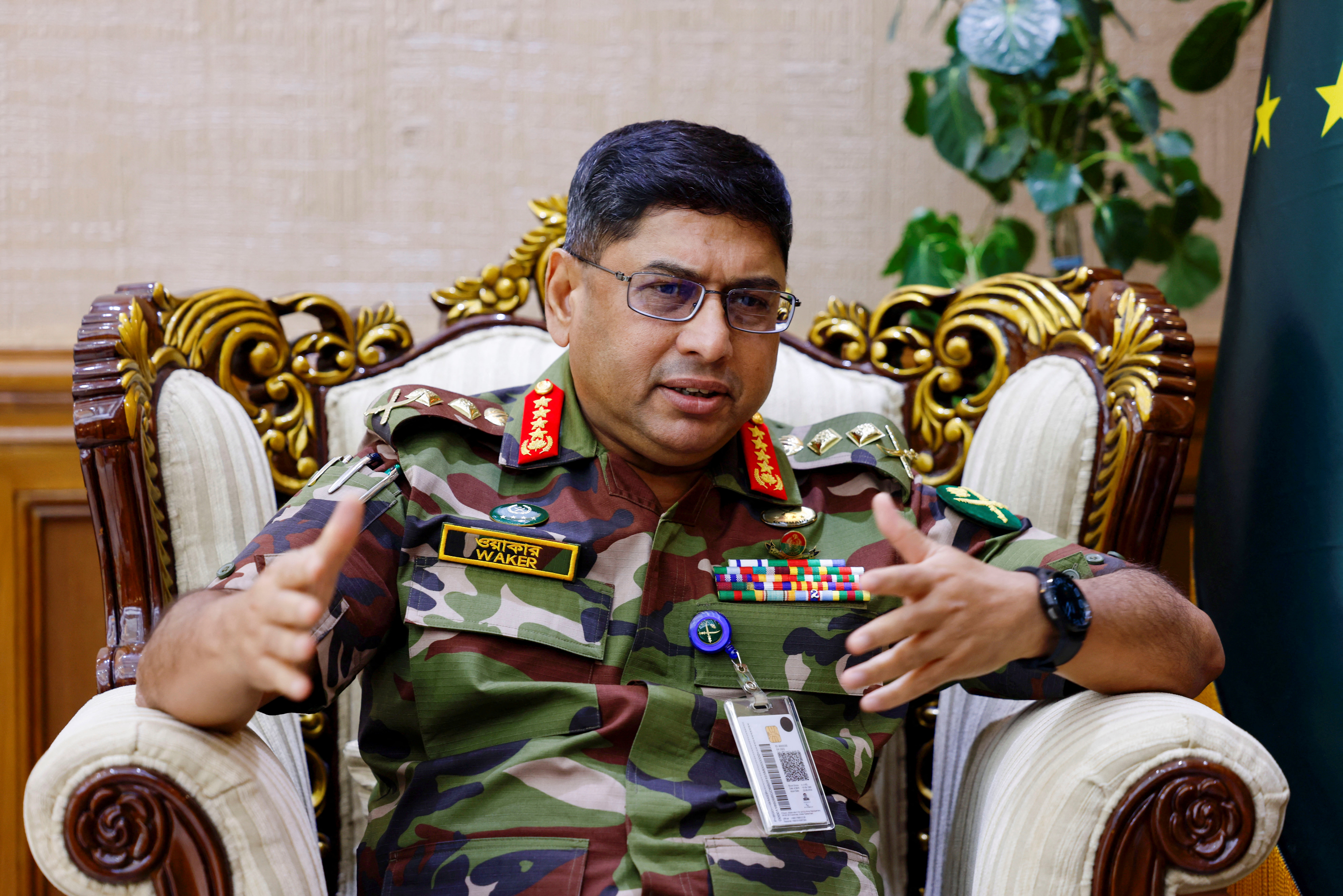 Bangladesh's Chief of Army Staff General Waker-uz-Zaman gestures during an interview with Reuters at his office in the Bangladesh Army Headquarters, in Dhaka