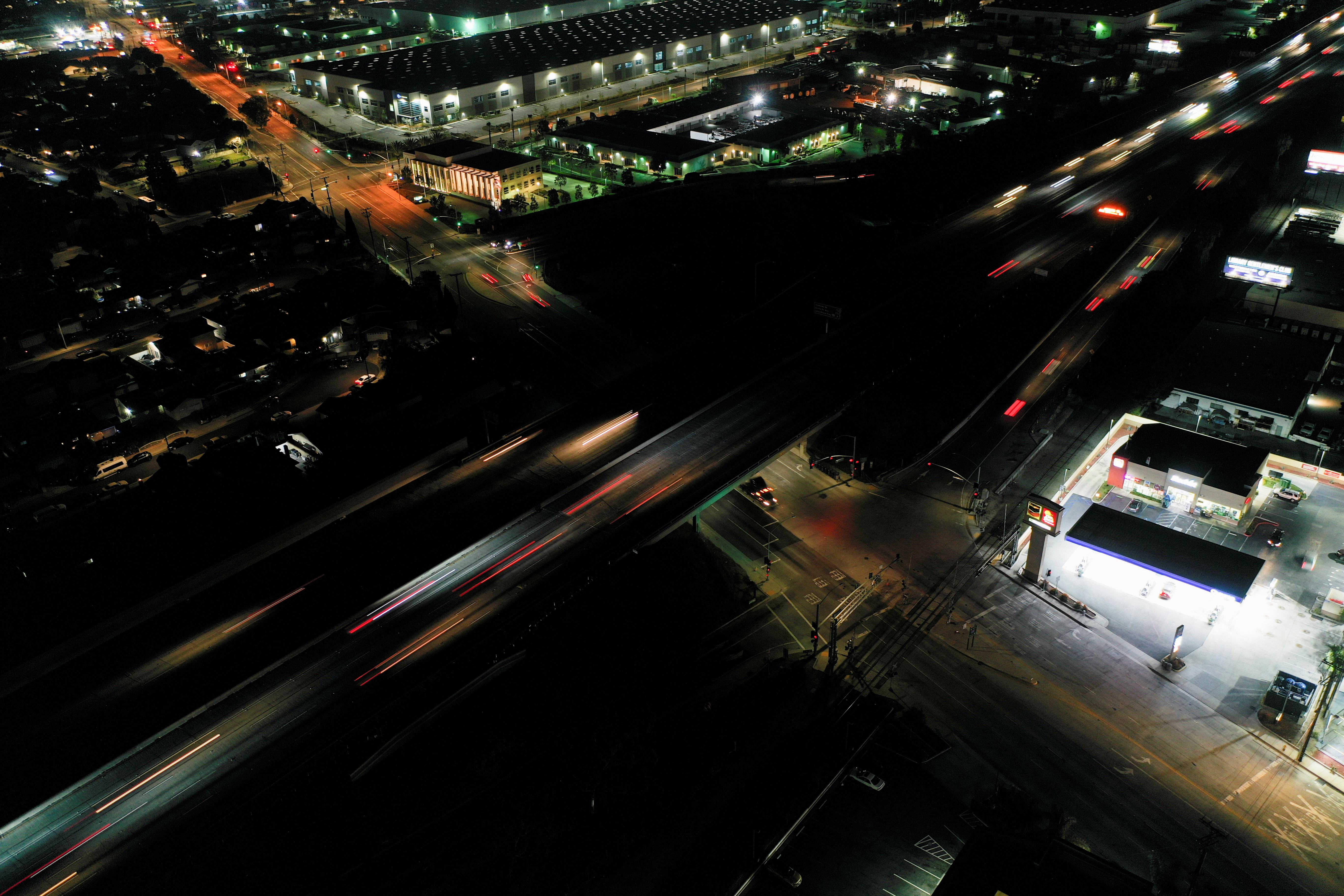 Nighttime aerial view of vehicle traffic along Interstate 405