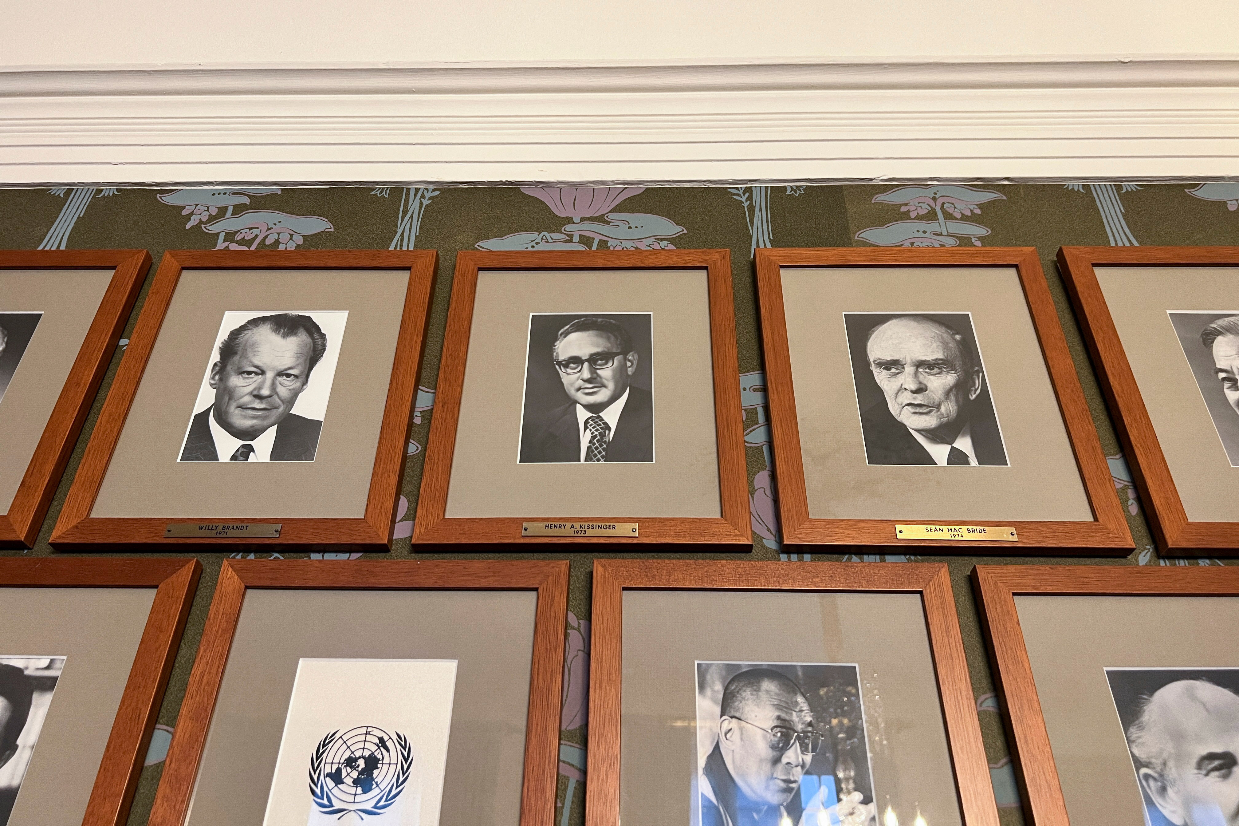 Portraits of Nobel Peace Prize laureates, including of Henry Kissinger, are seen in the meeting room where the Norwegian Nobel Committee holds its meetings at the Norwegian Nobel Institute in Oslo
