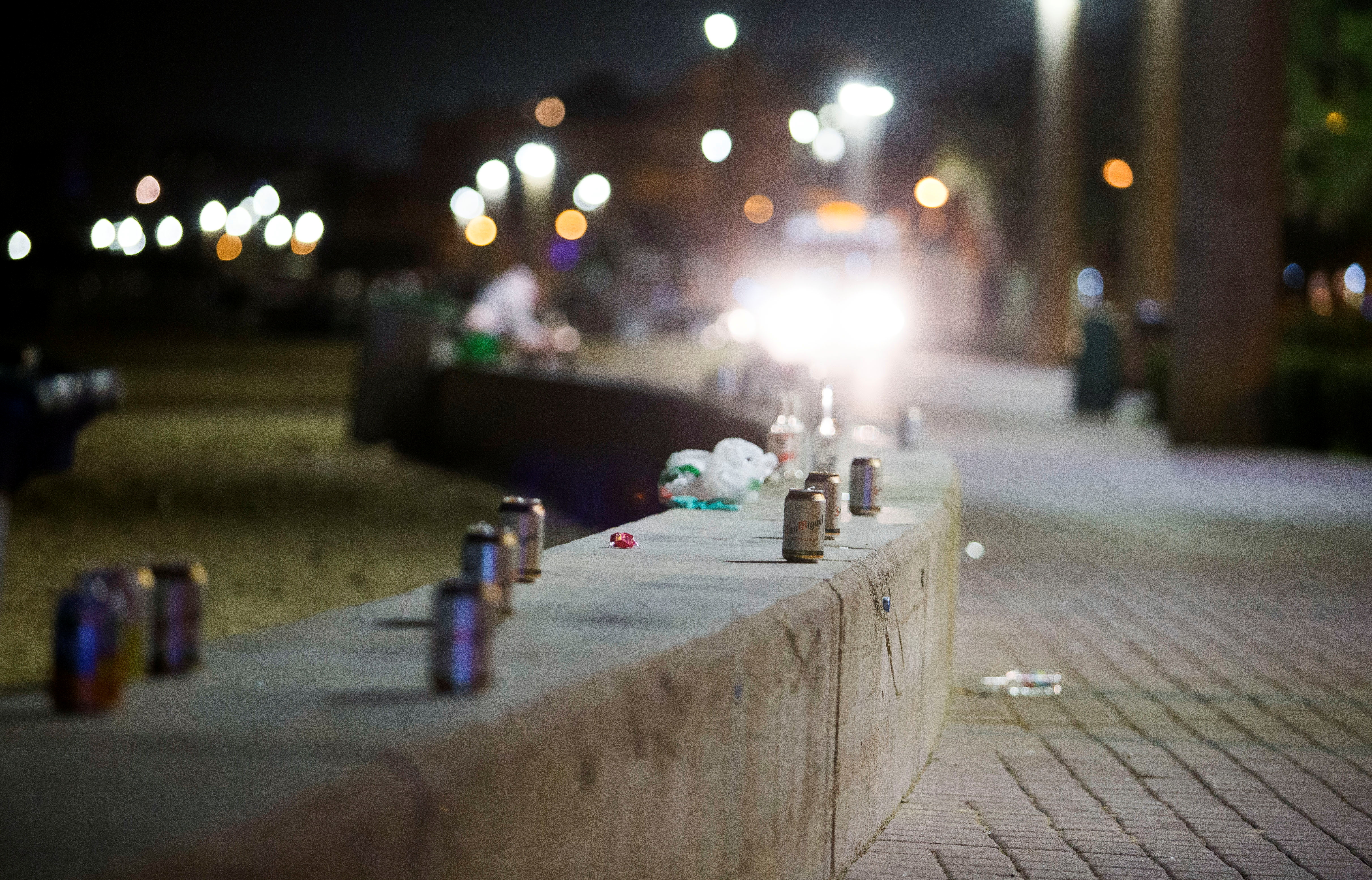 Bottles of drink and cans are seen in Playa de Palma beach on the island of Mallorca, as Spanish regions with a low coronavirus disease (COVID-19) infection rate were allowed to reopen nightlife with some restrictions, in Mallorca, Spain, June 5, 2021. REUTERS/Enrique Calvo