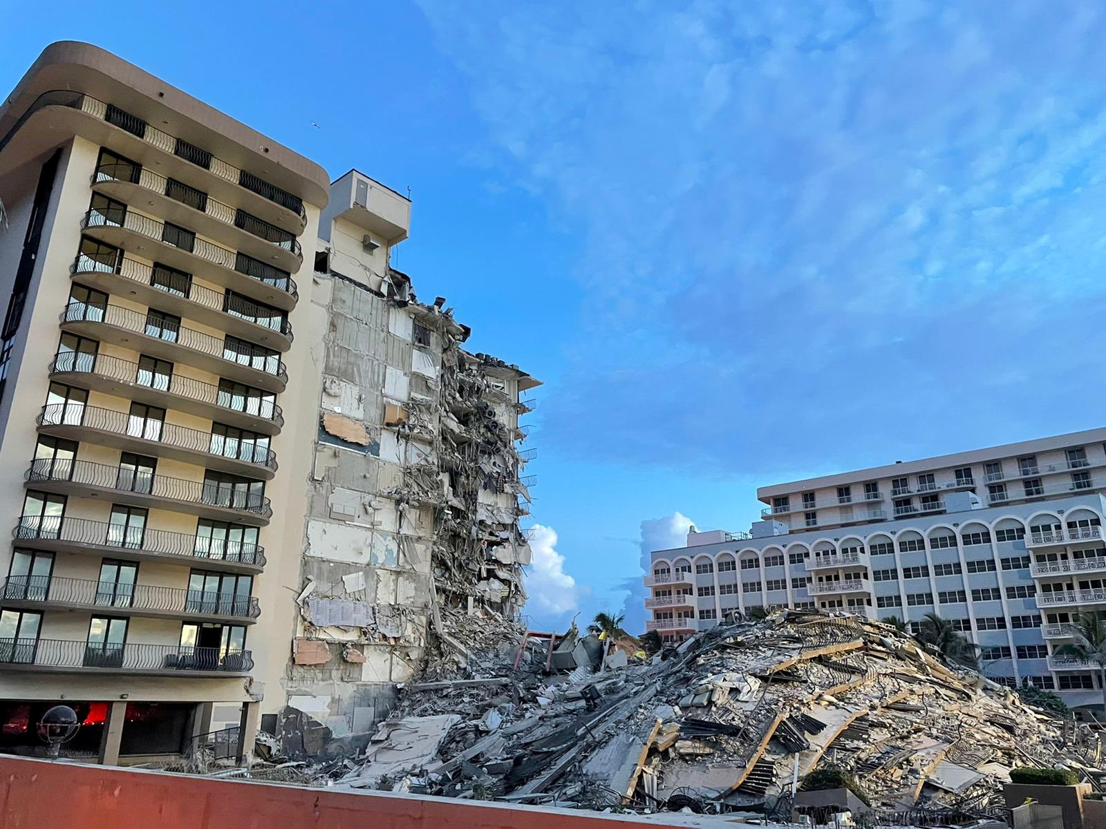 A view shows a partially collapsed building in Surfside, near Miami Beach, Florida, U.S., June 25, 2021. Miami-Dade Fire Rescue Department/Handout via REUTERS