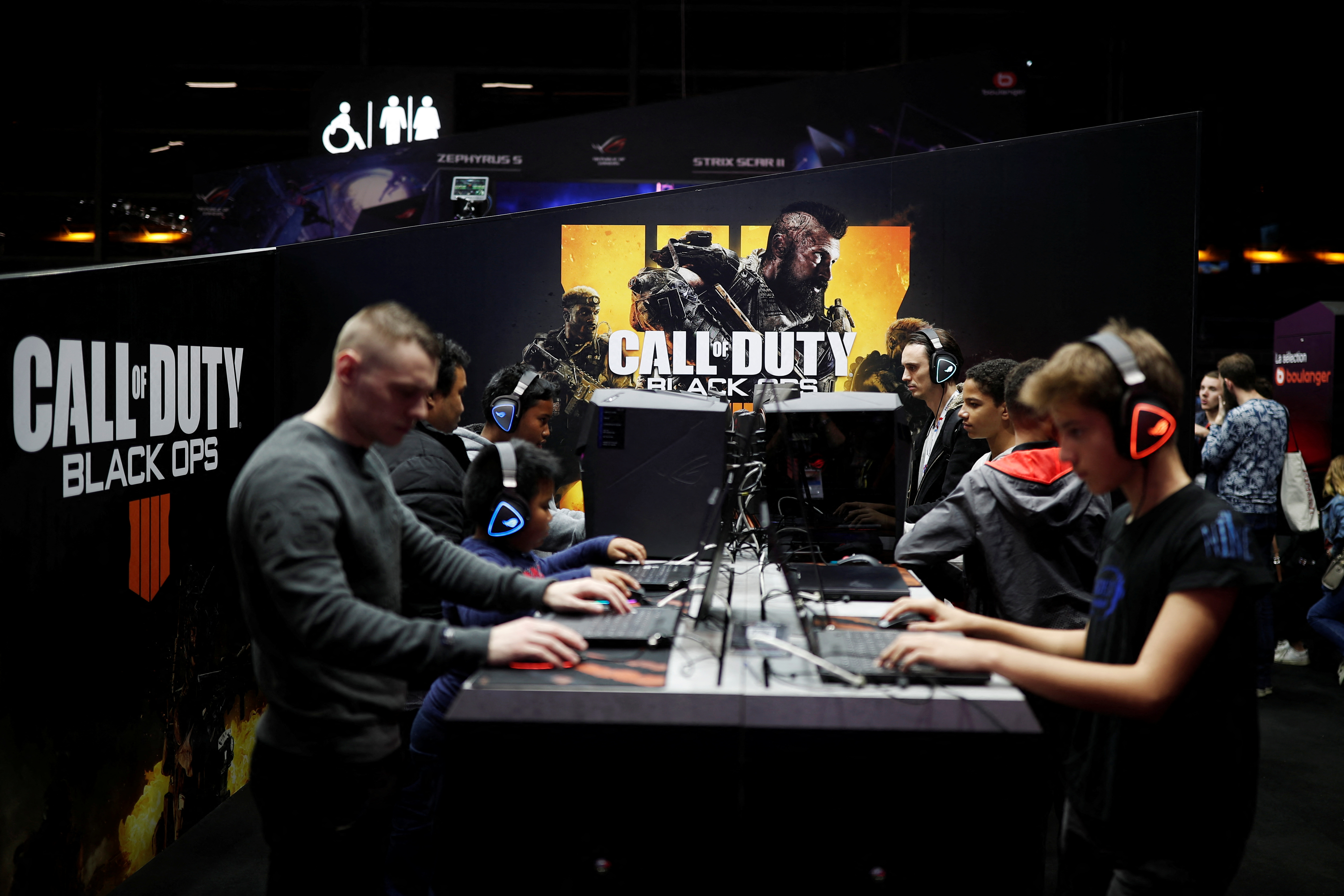 Gamers play Call of Duty: Black Ops 4 at the Paris Games Week (PGW), a trade fair for video games in Paris