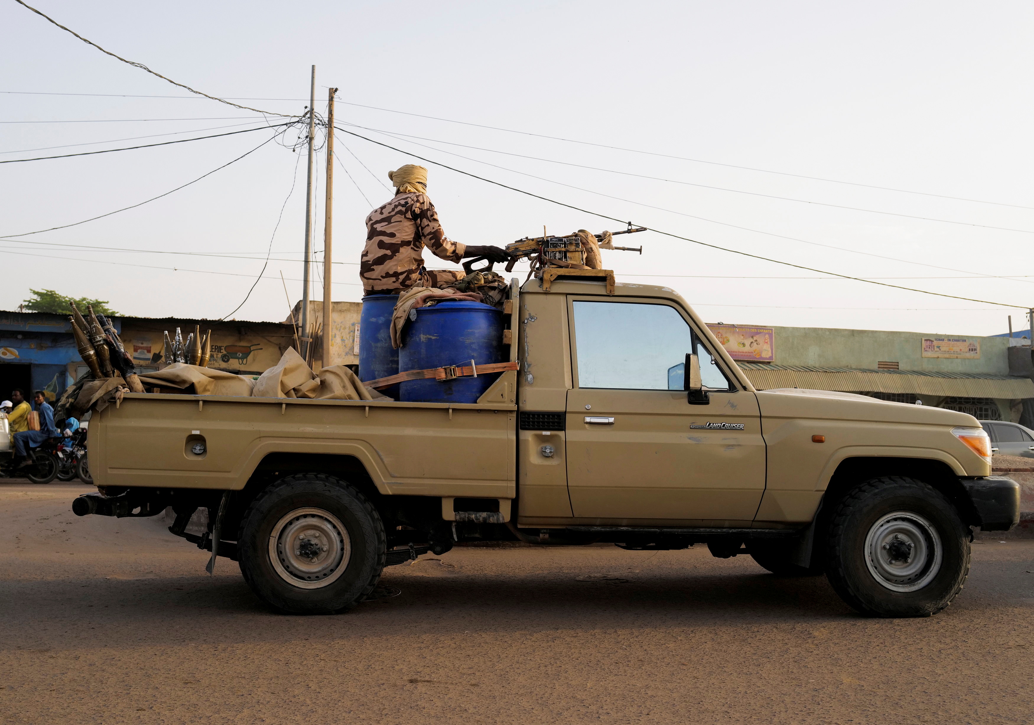 Members of the security forces patrol Chad's capital N'Djamena following the battlefield death of President Idriss Deby in N'Djamena