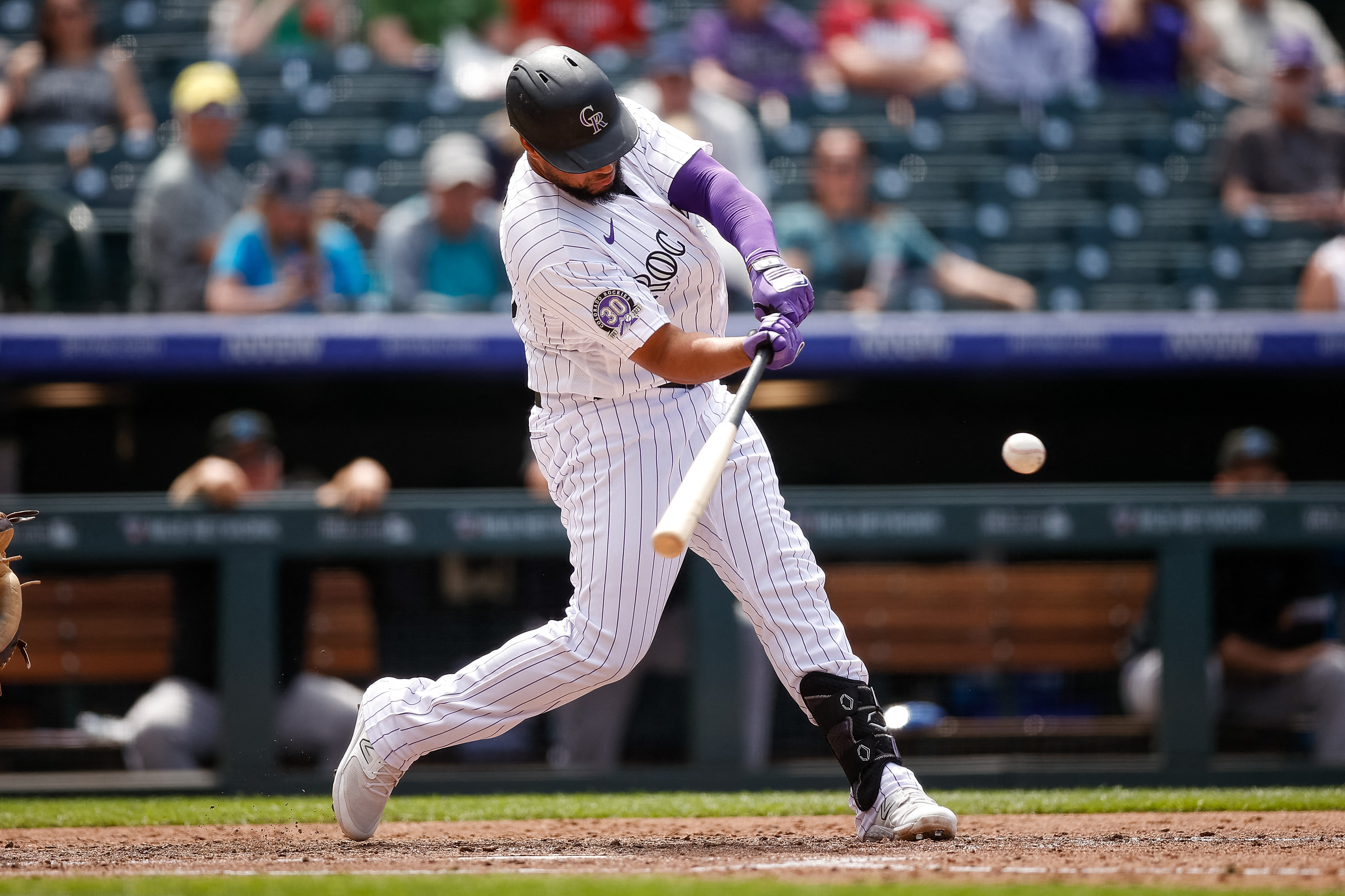 Colorado Rockies outfielder Randal Grichuk reacts after pitching during the  ninth inning of the first baseball game of the team's doubleheader against  the Miami Marlins on Wednesday, June 1, 2022, in Denver.