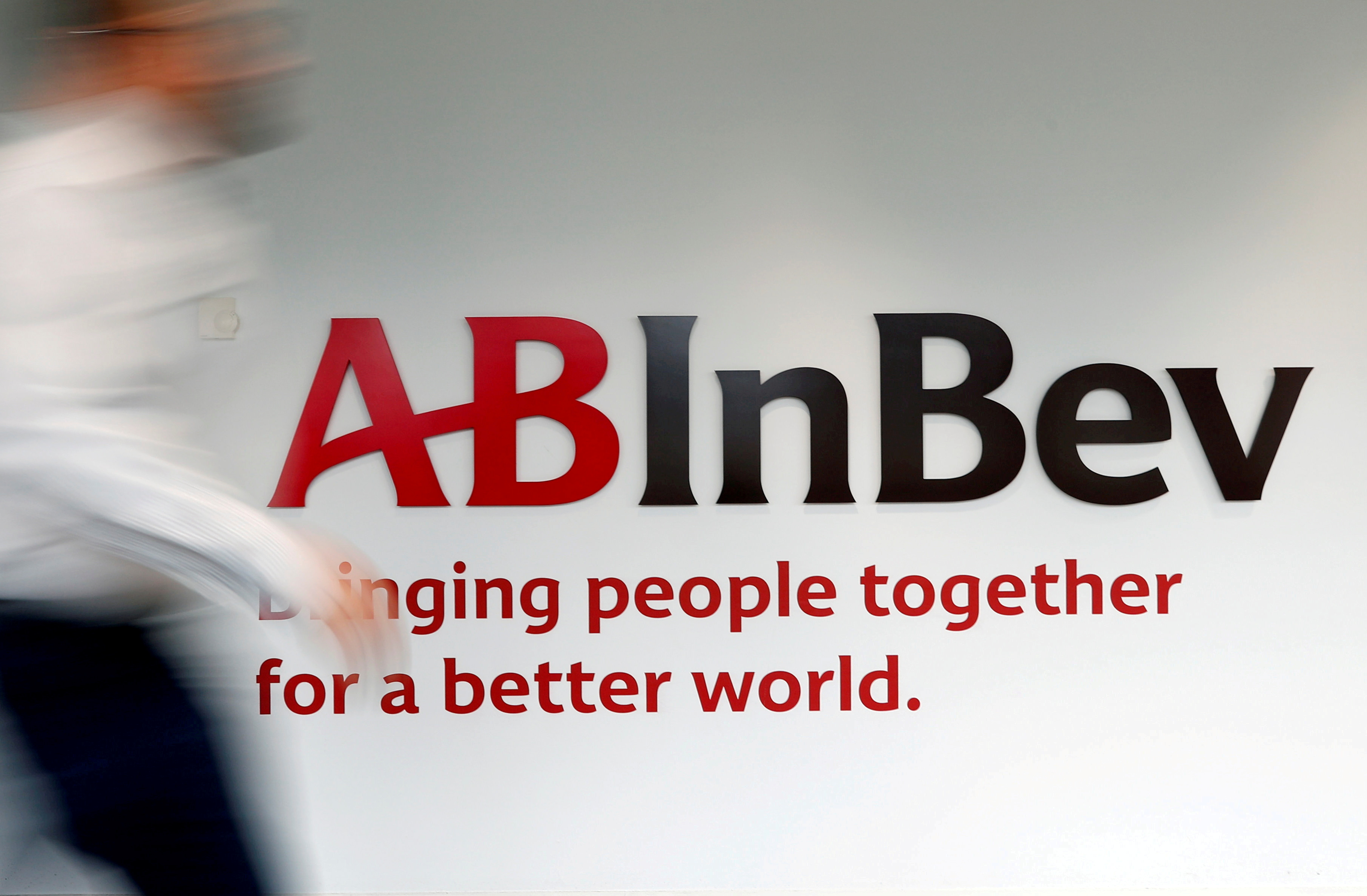 The logo of AB InBev is pictured inside the brewer's headquarters in Leuven