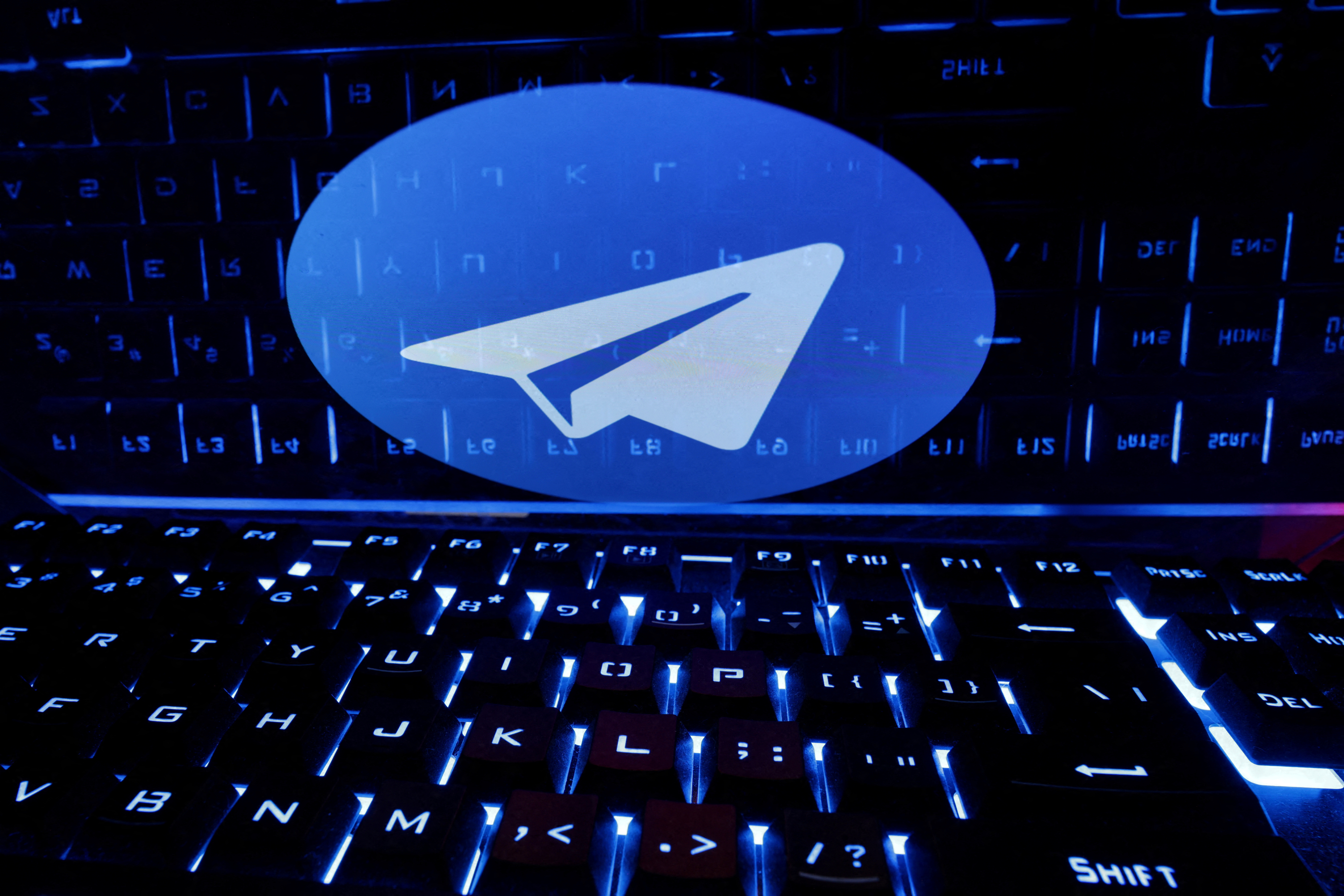 The image shows the Telegram logo