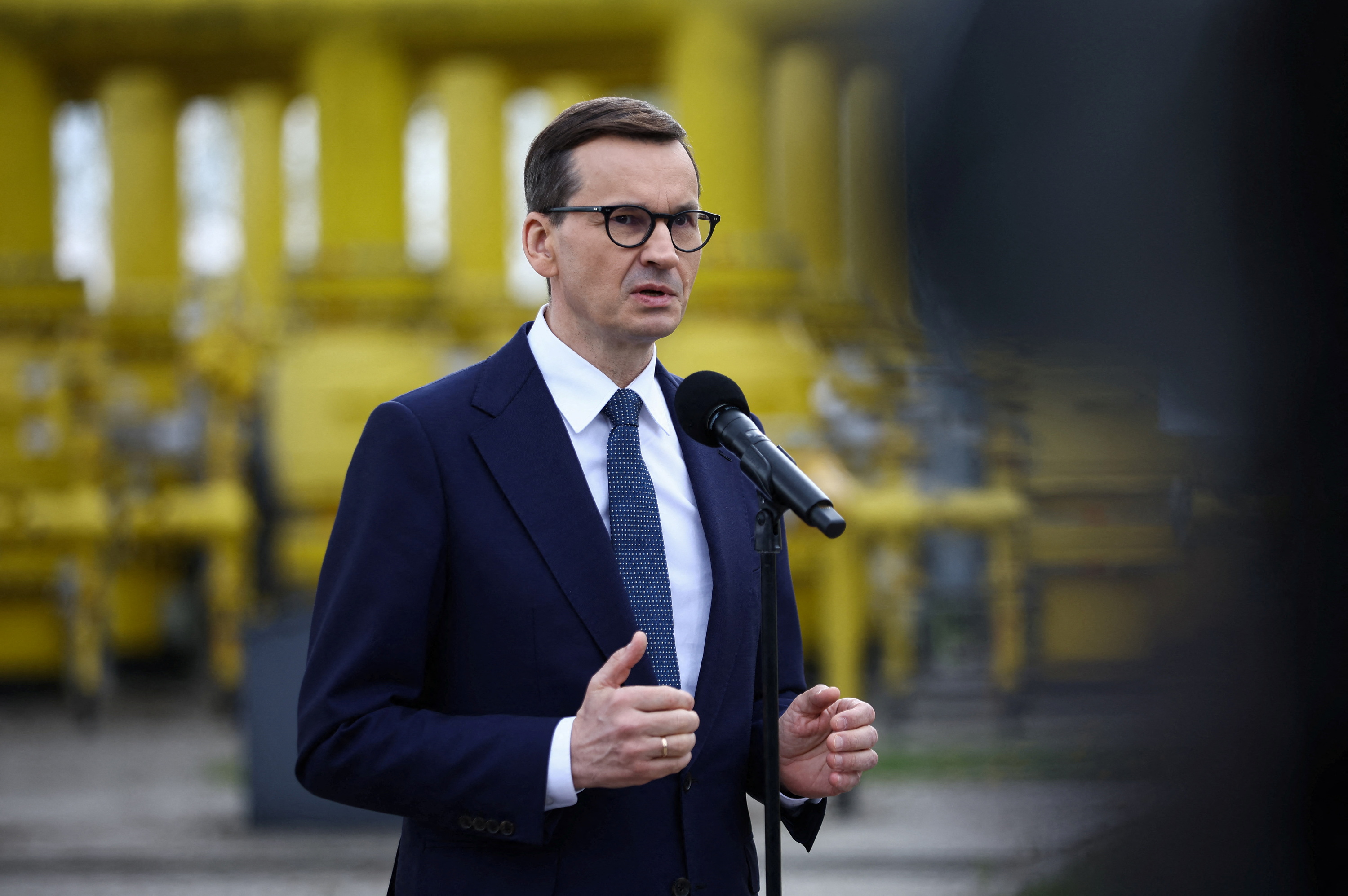 Poland's Prime Minister Mateusz Morawiecki speaks during a news conference near the gas installation at a Gaz-System gas compressor station in Rembelszczyzna