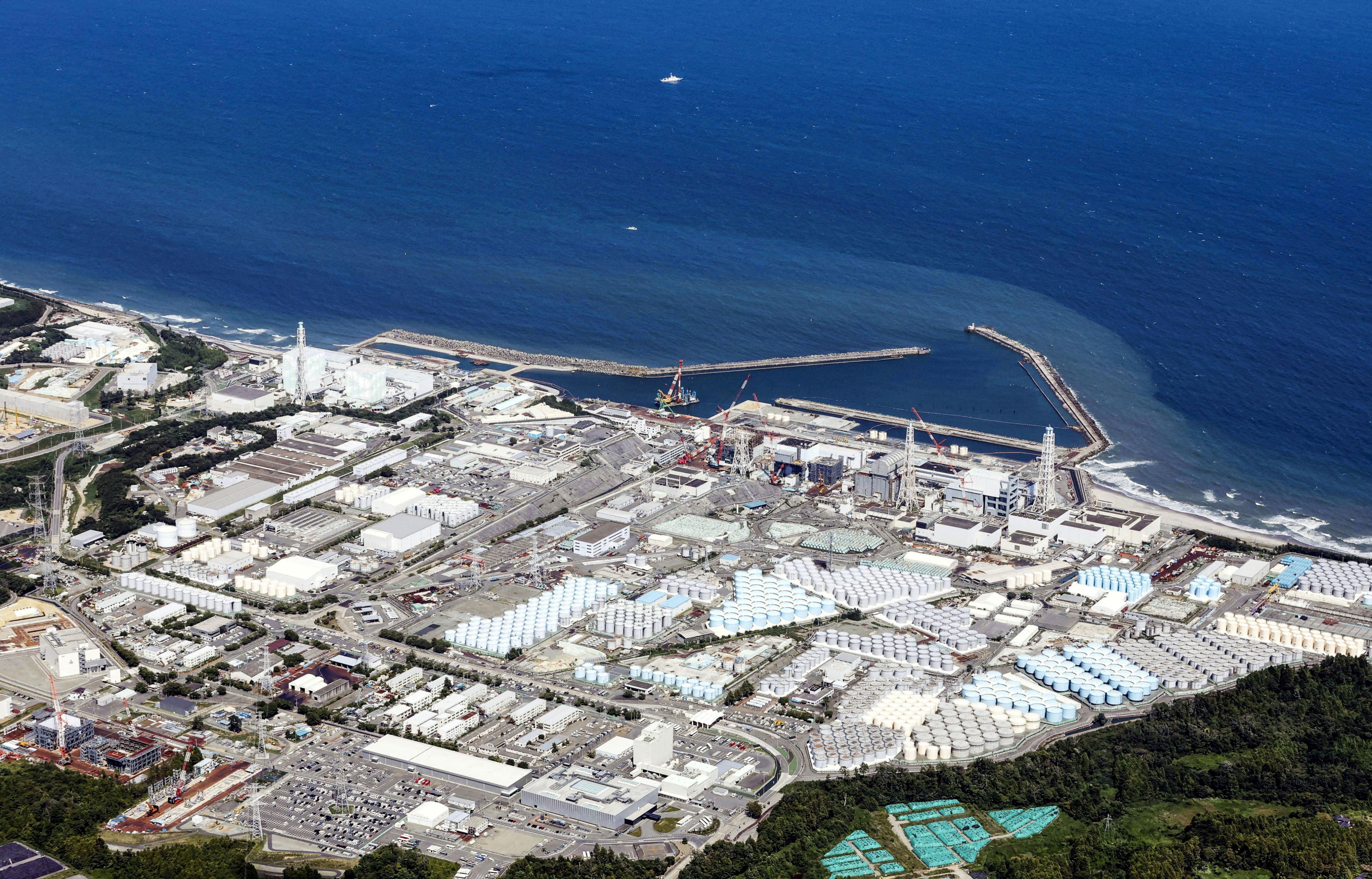 An aerial view shows the tsunami-crippled Fukushima Daiichi nuclear power plant which started releasing treated radioactive water into the Pacific Ocean, in Okuma town