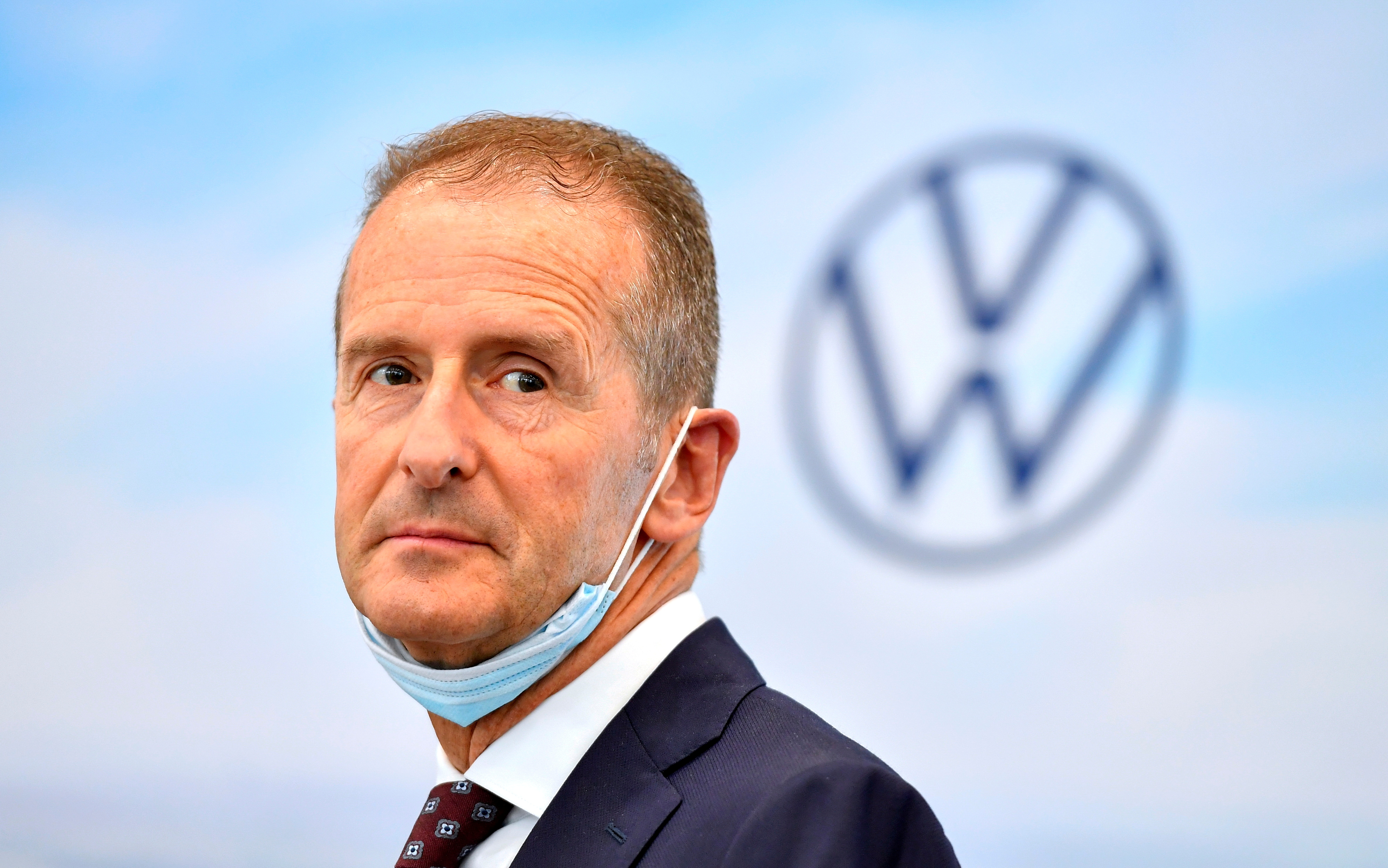 Volkswagen CEO Herbert Diess looks on during his visit to Volkswagen's electric car plant in Zwickau, Germany, June 23, 2021. REUTERS/Matthias Rietschel/File Photo