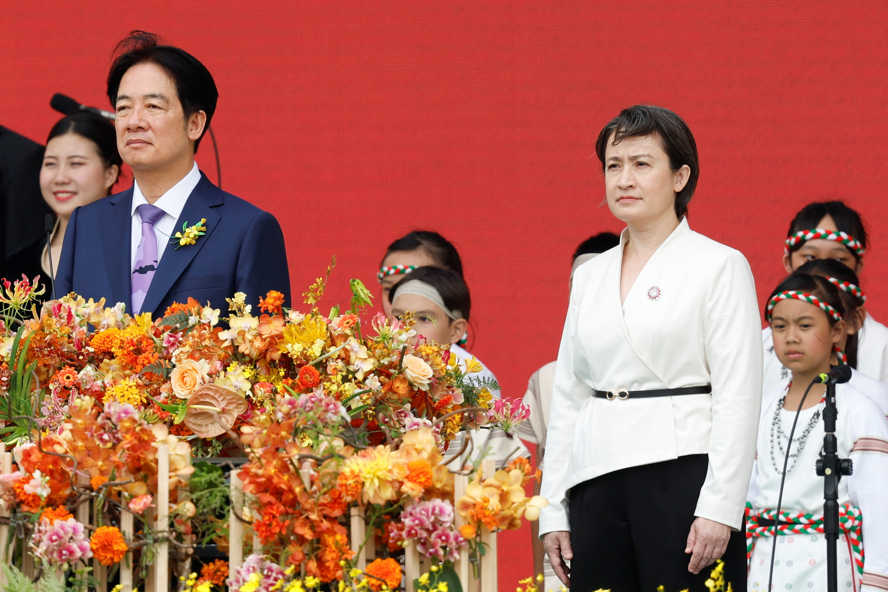 New Taiwanese president calls on China to stop its threats | Reuters