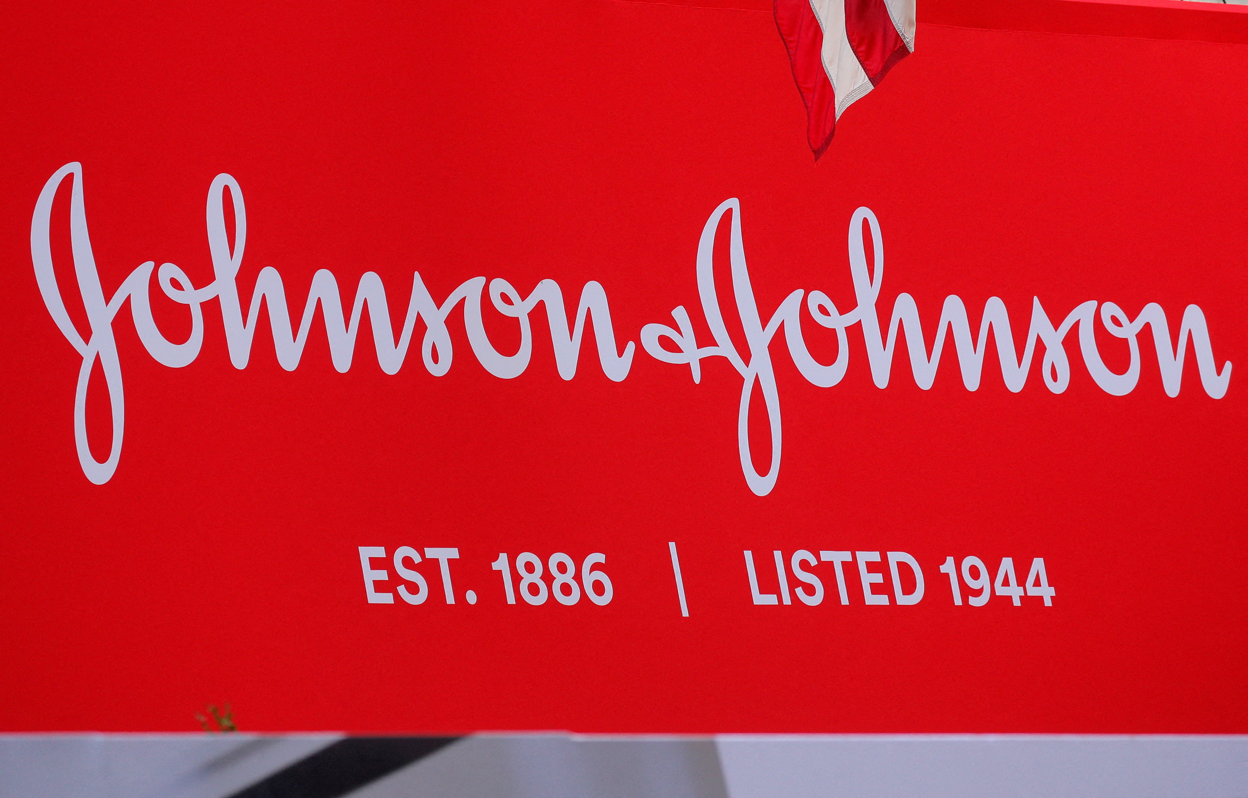 The company logo for Johnson & Johnson is displayed to celebrate the 75th anniversary of the company's listing at the NYSE in New York