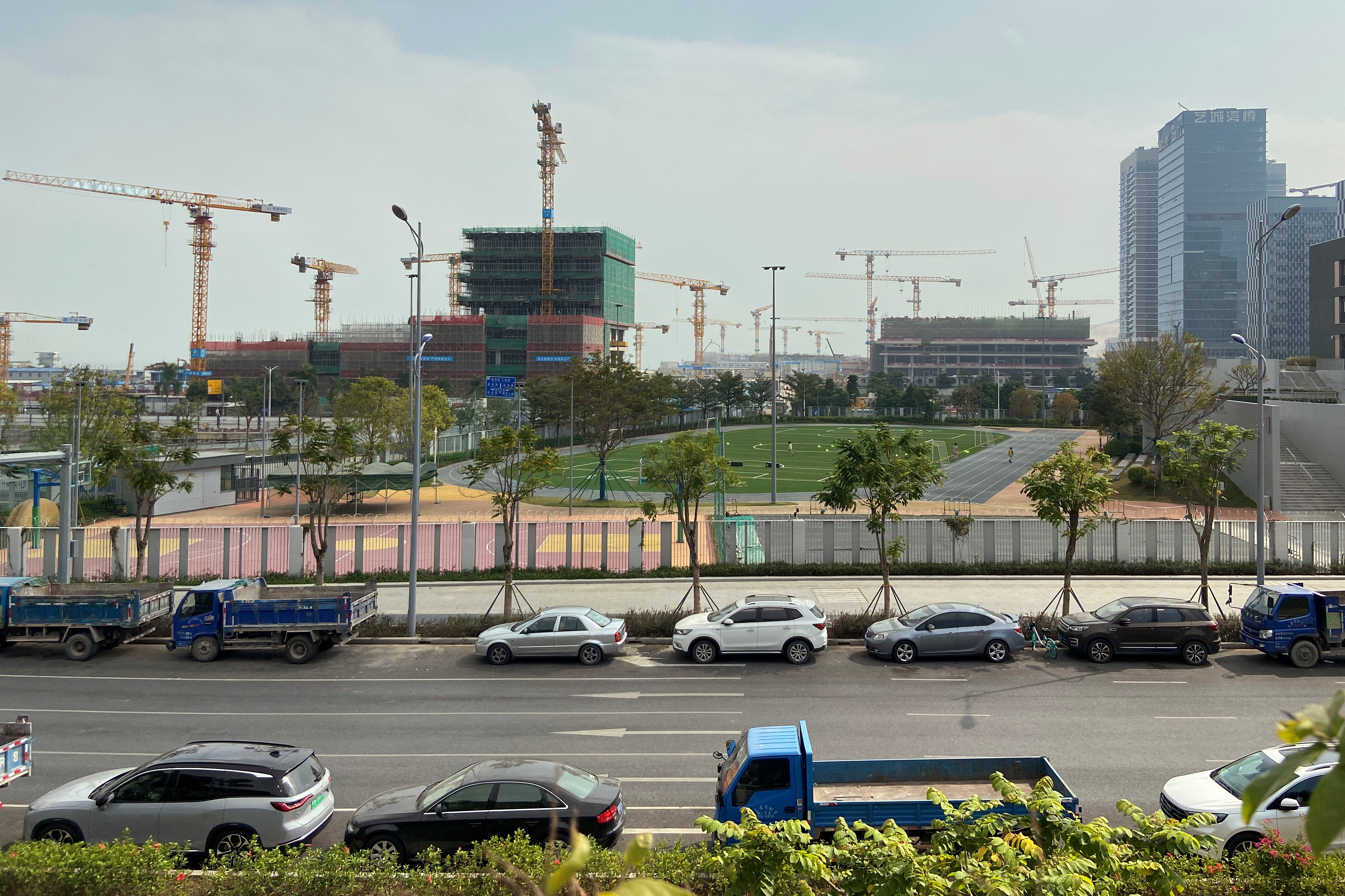 Real estate projects under construction are seen in the Shekou area of Shenzhen, Guangdong