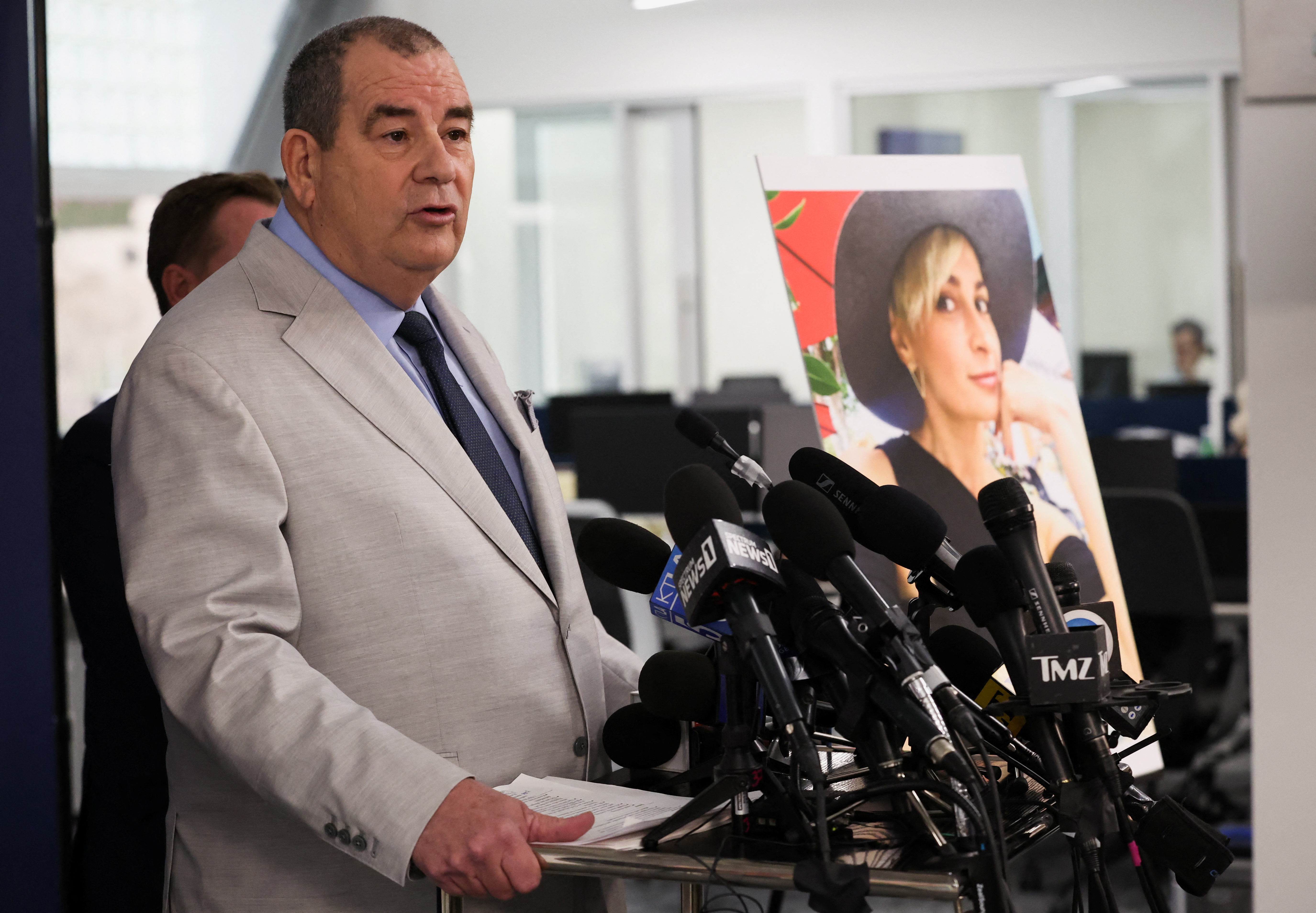 Brian Panish, lead attorney for late cinematographer Halyna Hutchins speaks to media next to her picture, in Los Angeles, California, U.S., February 15, 2022. REUTERS/Mario Anzuoni