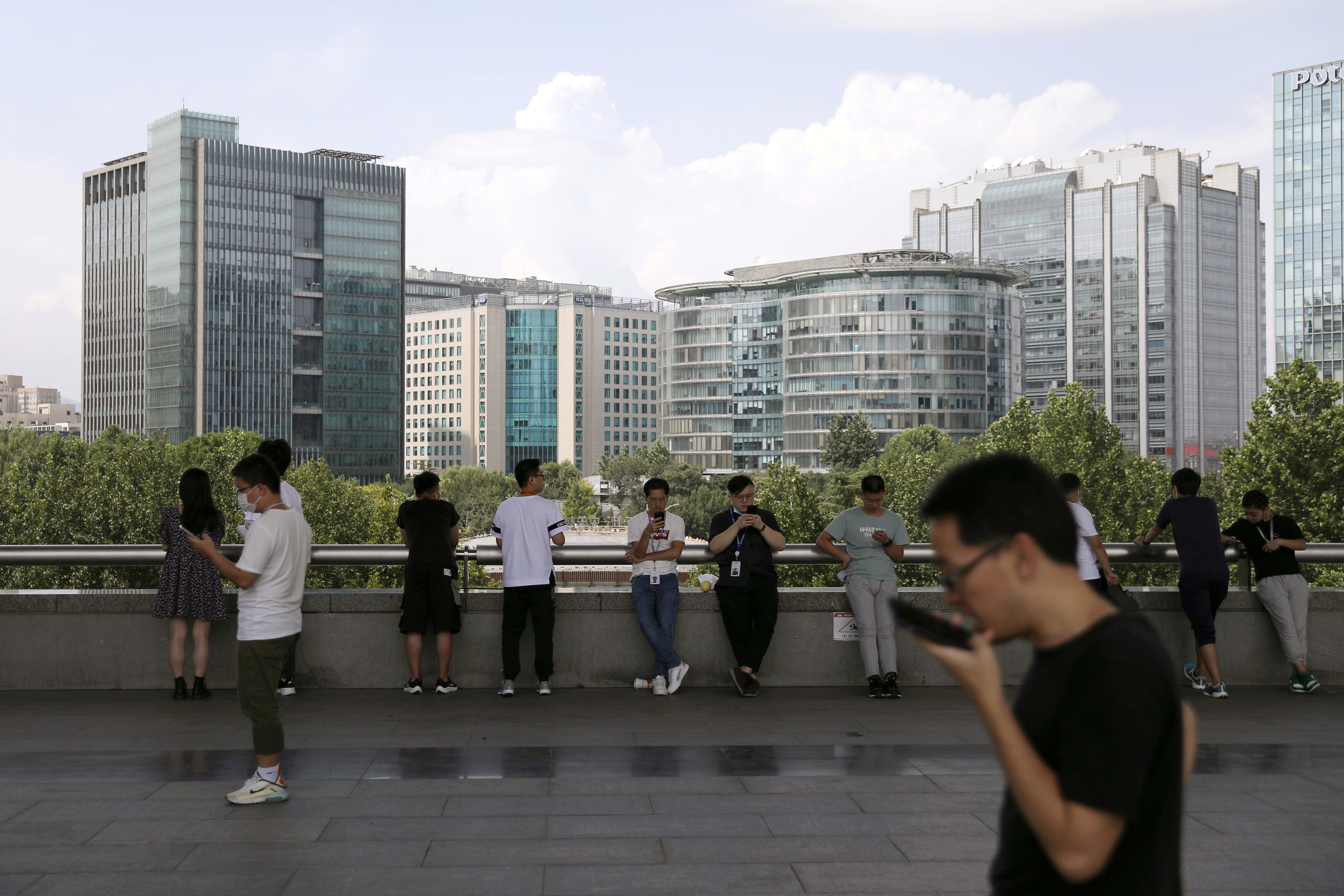 People are seen at Beijing's tech hub Zhongguancun