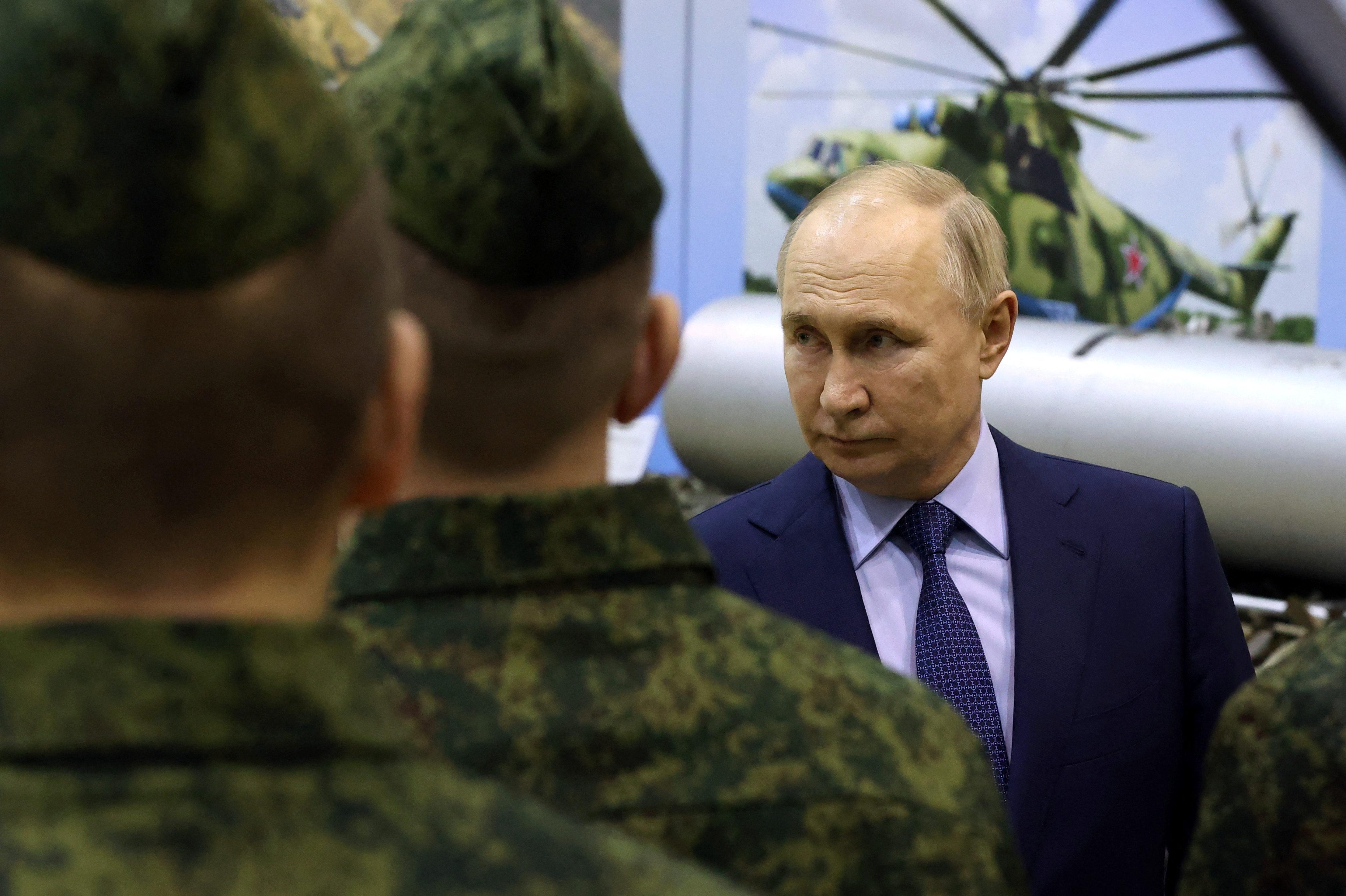 Russian President Vladimir Putin meets with military pilots in Torzhok