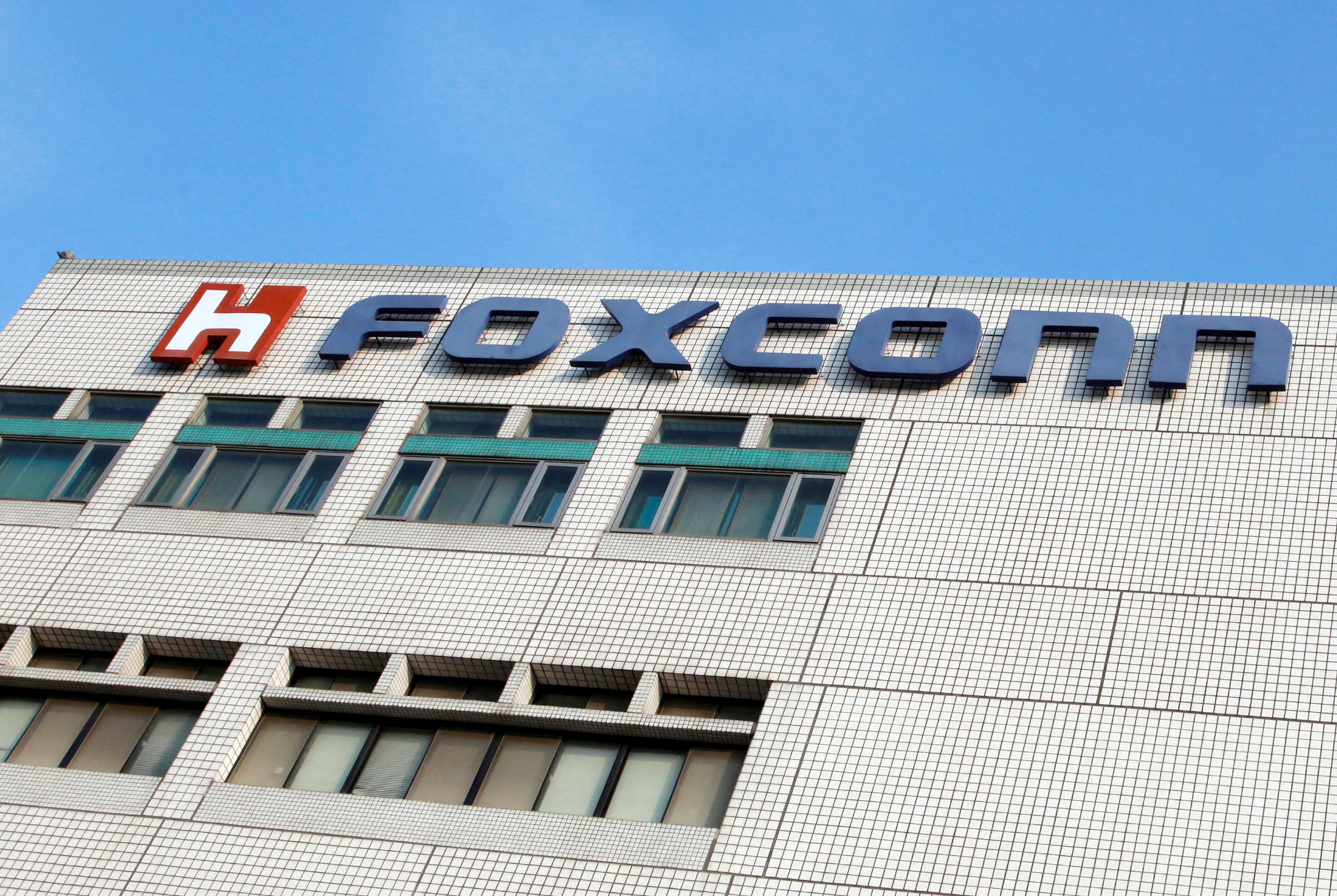 The Foxconn logo is seen on the headquarters building in Tucheng, Taipei County