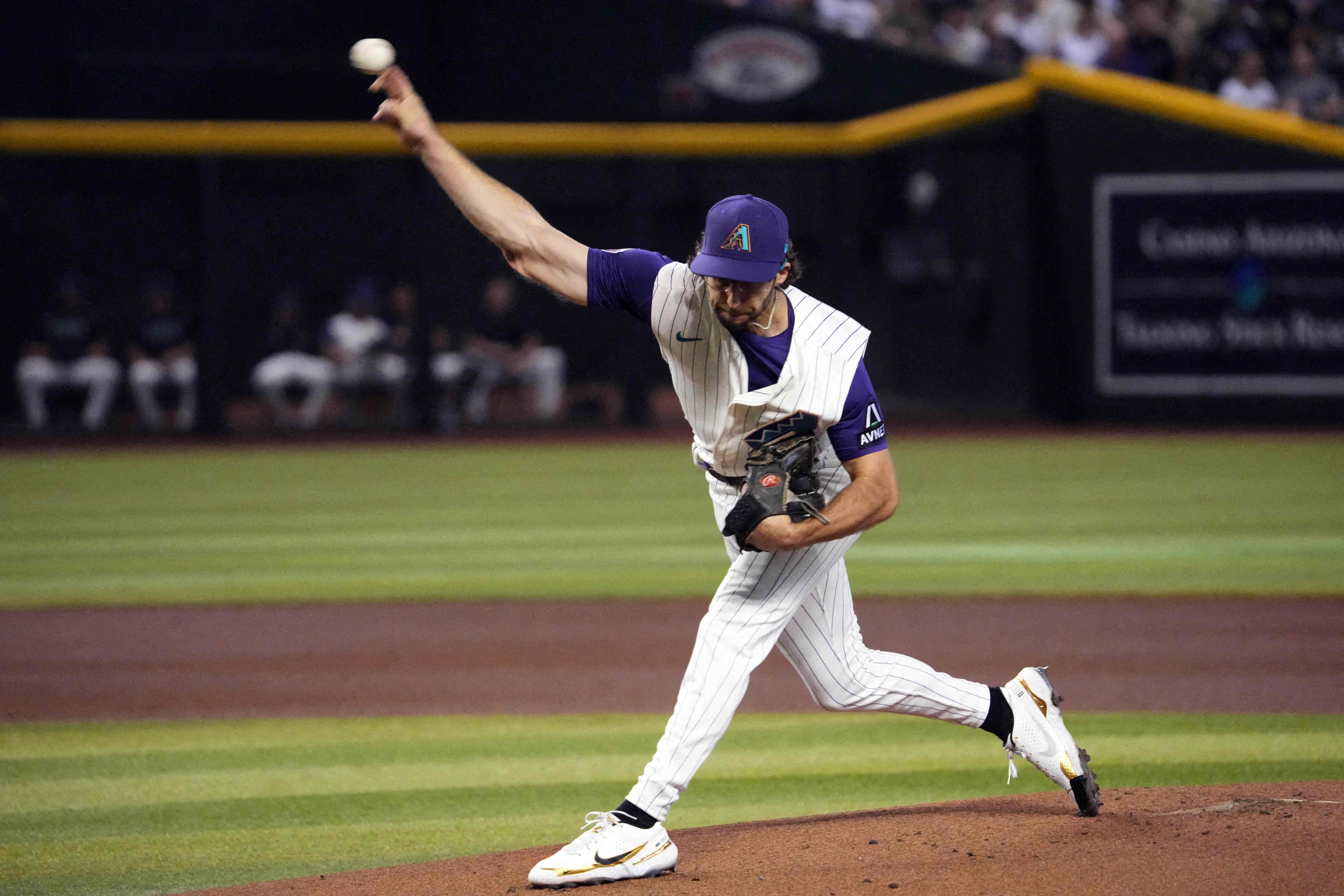 Arizona Diamondbacks starting pitcher Zac Gallen works against a San Diego  Padres batter during the first inning of a baseball game Tuesday, April 4,  2023, in San Diego. (AP Photo/Gregory Bull Stock