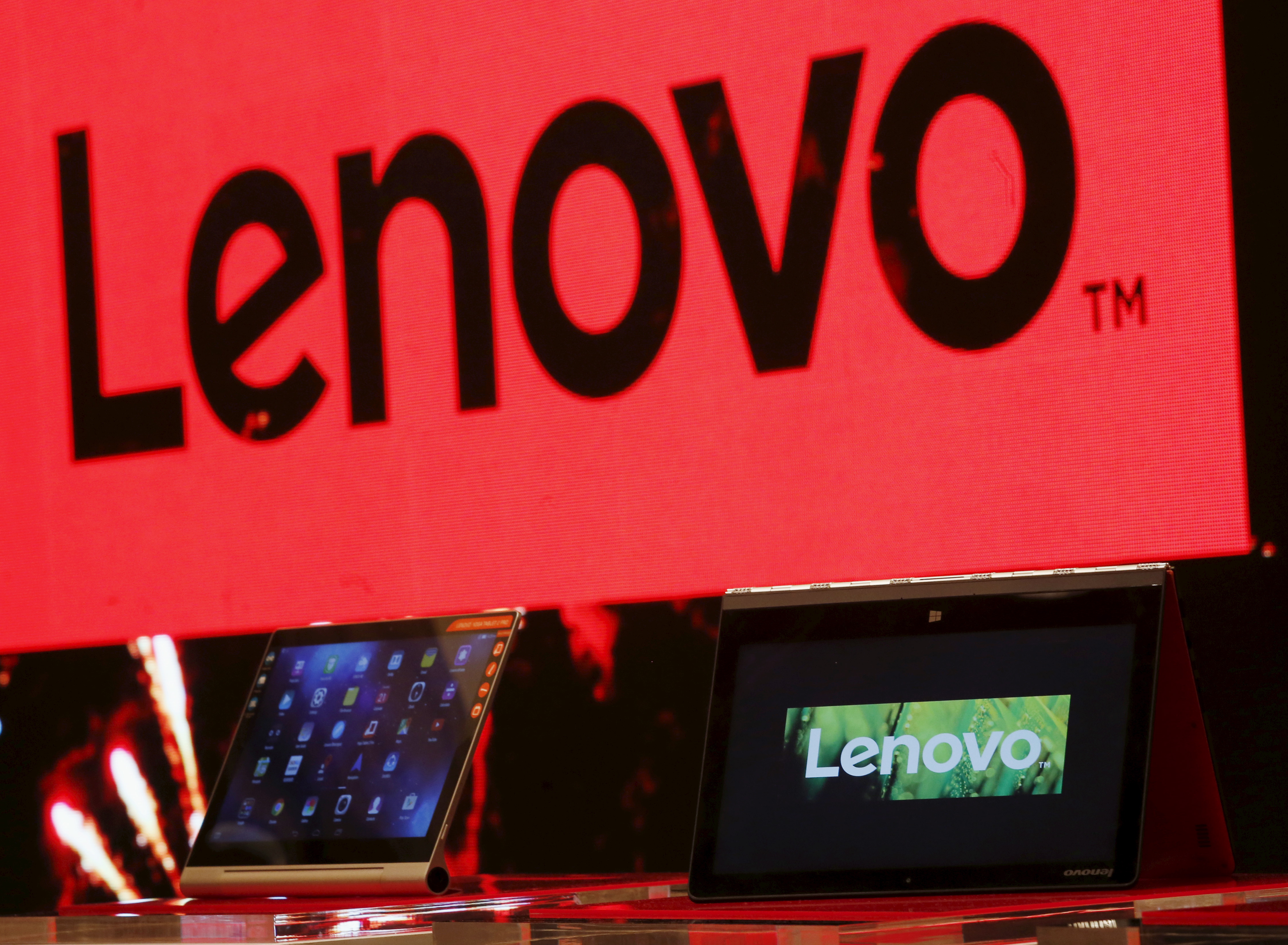 A Lenovo ultrabook and a tablet are displayed during a news conference in Hong Kong