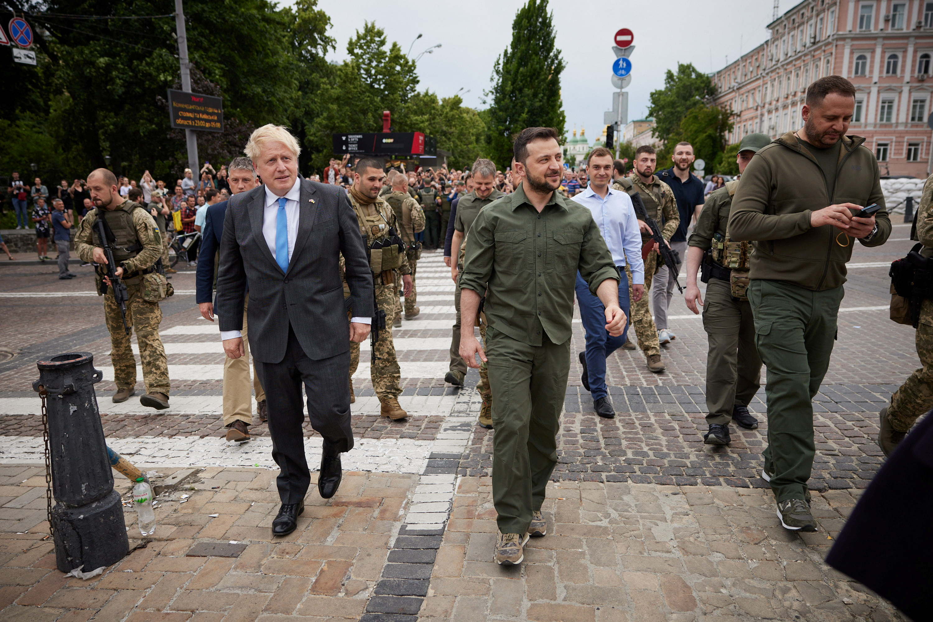 British PM Johnson and Ukraine's President Zelenskiy walk to Mykhailivska Square in Kyiv