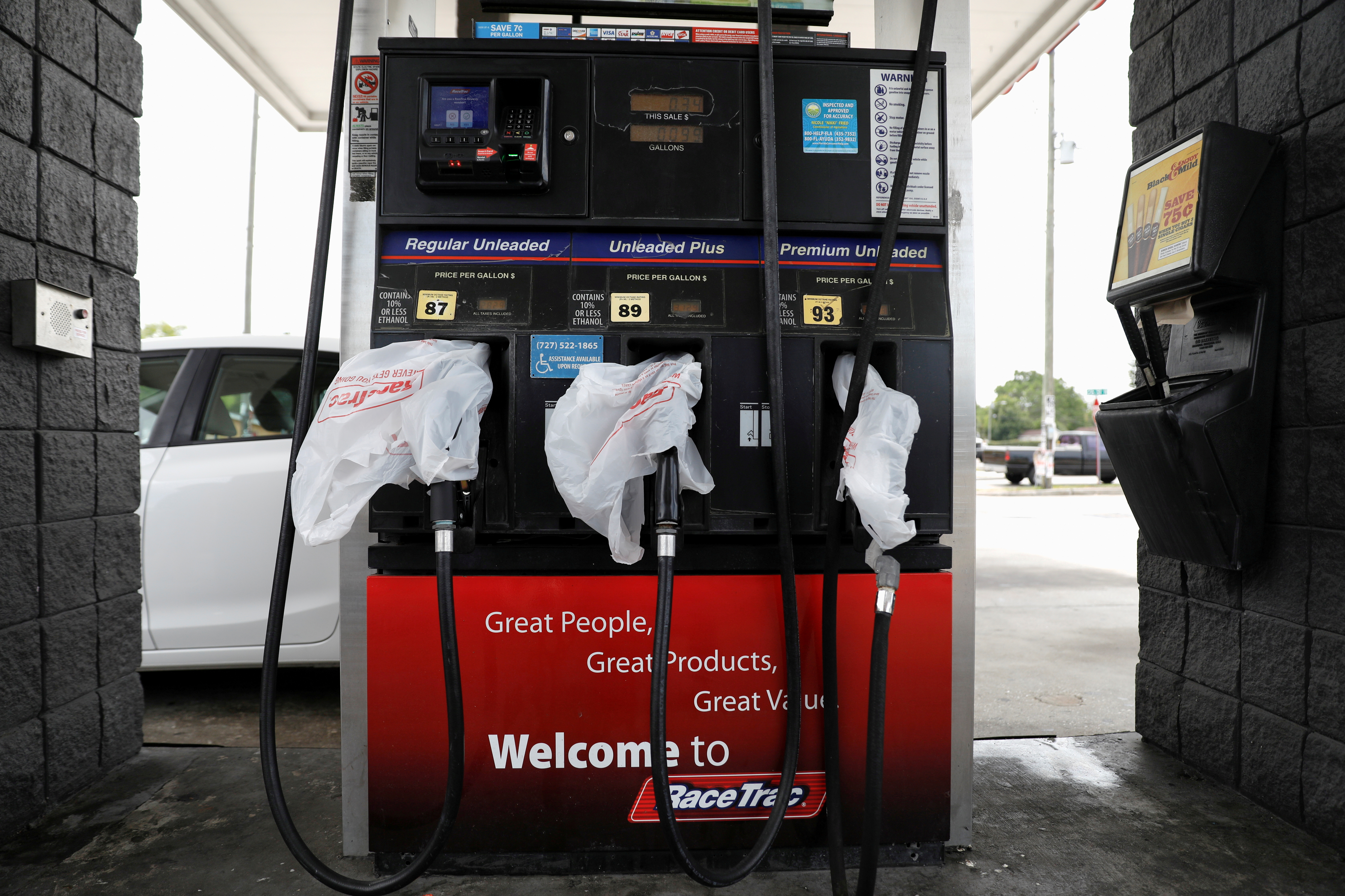 Gas pumps are covered with plastic bags at the Race Trac gas station, after a cyberattack crippled the biggest fuel pipeline in the country, run by Colonial Pipeline, in St. Petersburg, Florida, U.S., May 12, 2021. REUTERS/Octavio Jones/File Photo/File Photo
