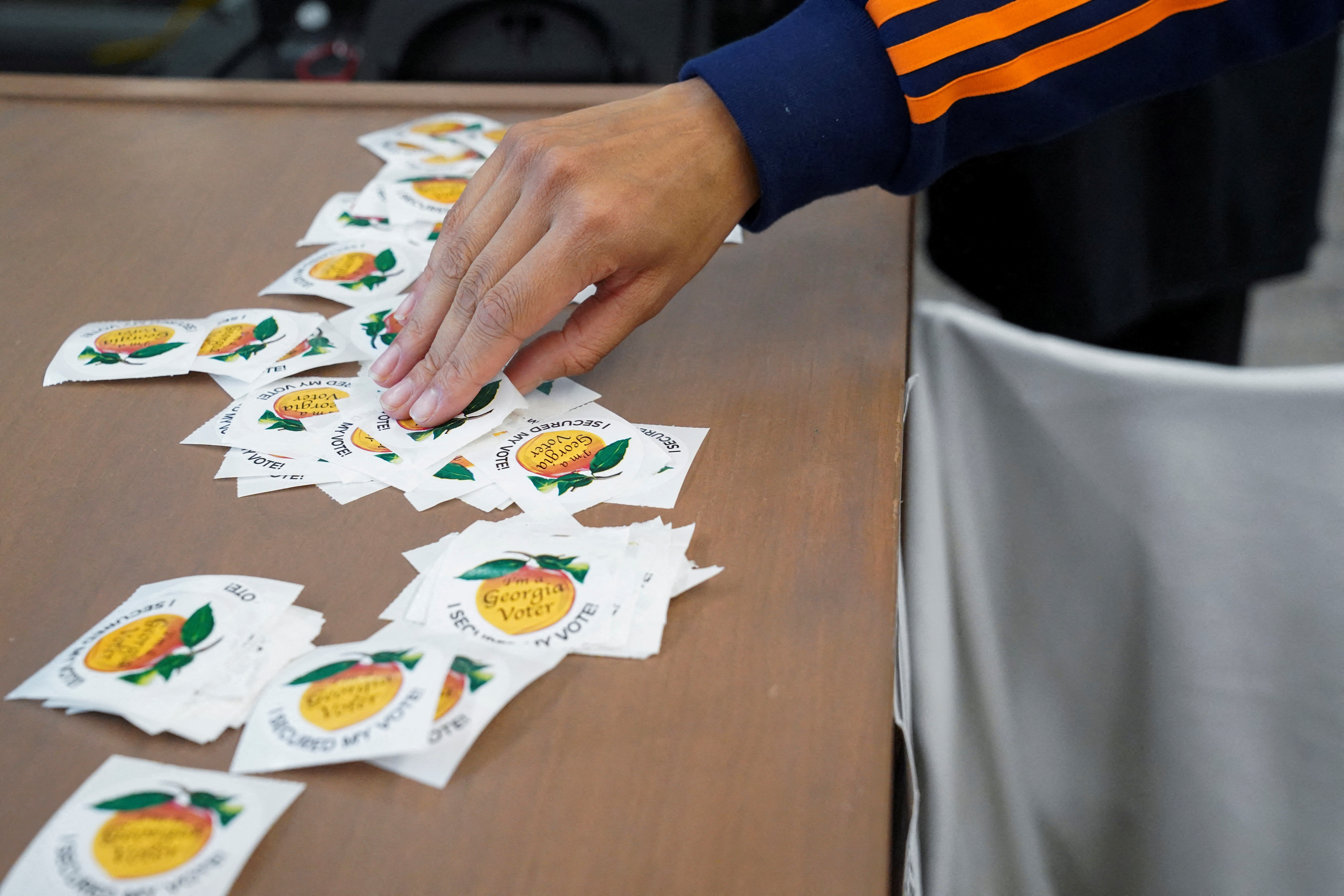 Georgians turned out a day after the battleground state opened early voting