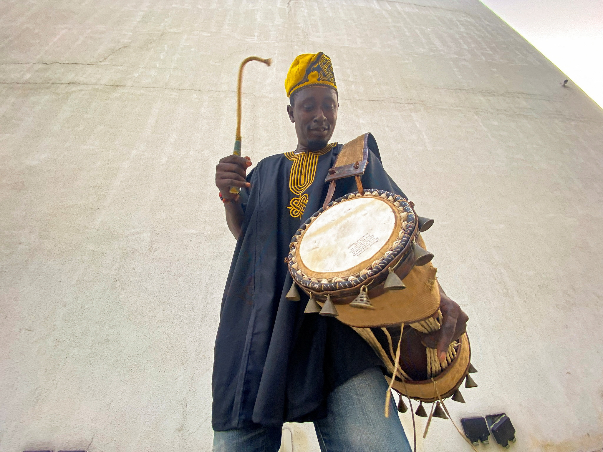 Nigerian drummer Adebayo Ayodeji performs during a drumming workshop for children in Lagos
