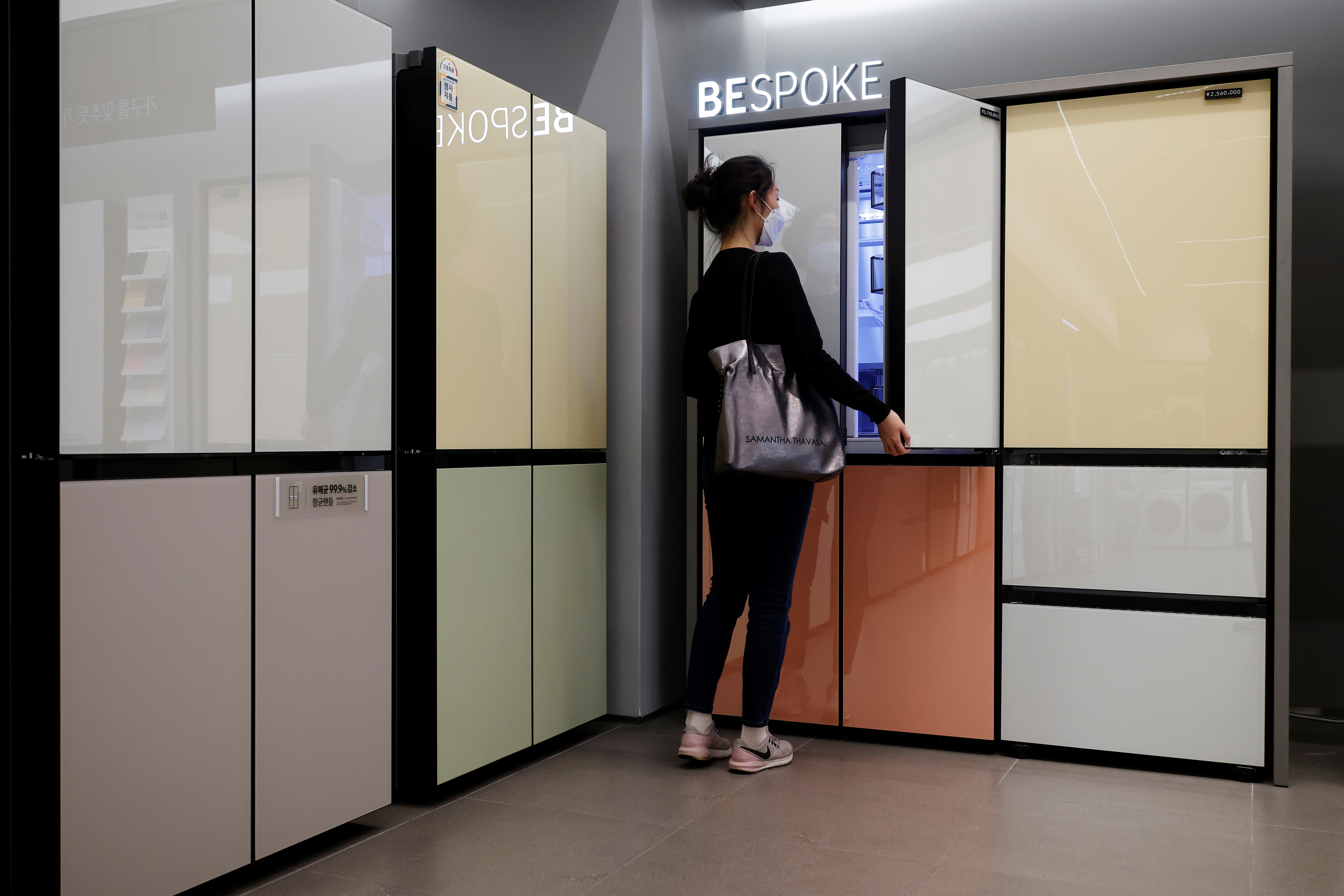 A woman looks around Samsung Electronics' BESPOKE refrigerators on display at its store in Seoul, South Korea, May 3, 2021. Picture taken on May 3, 2021.    REUTERS/Kim Hong-Ji
