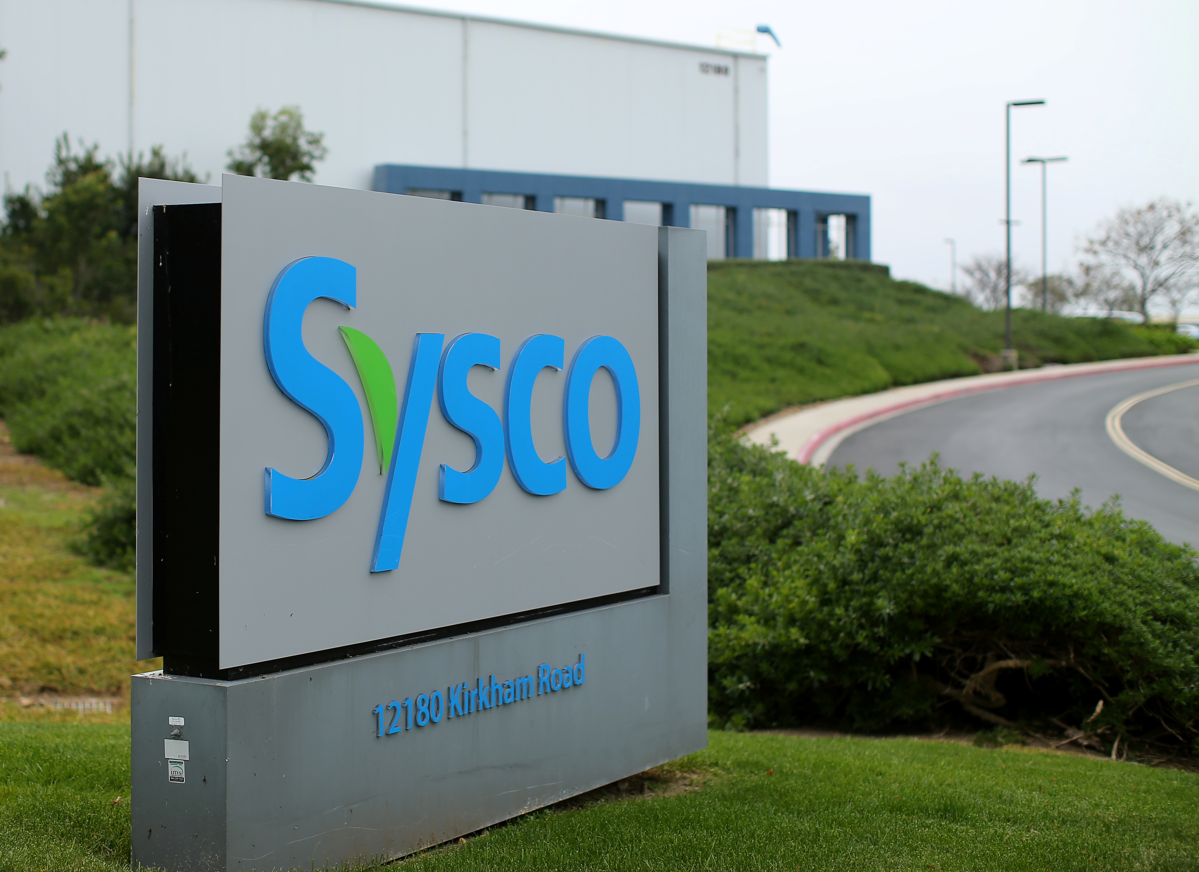 A Sysco sign is shown outside one of their distribution centers in Poway, California