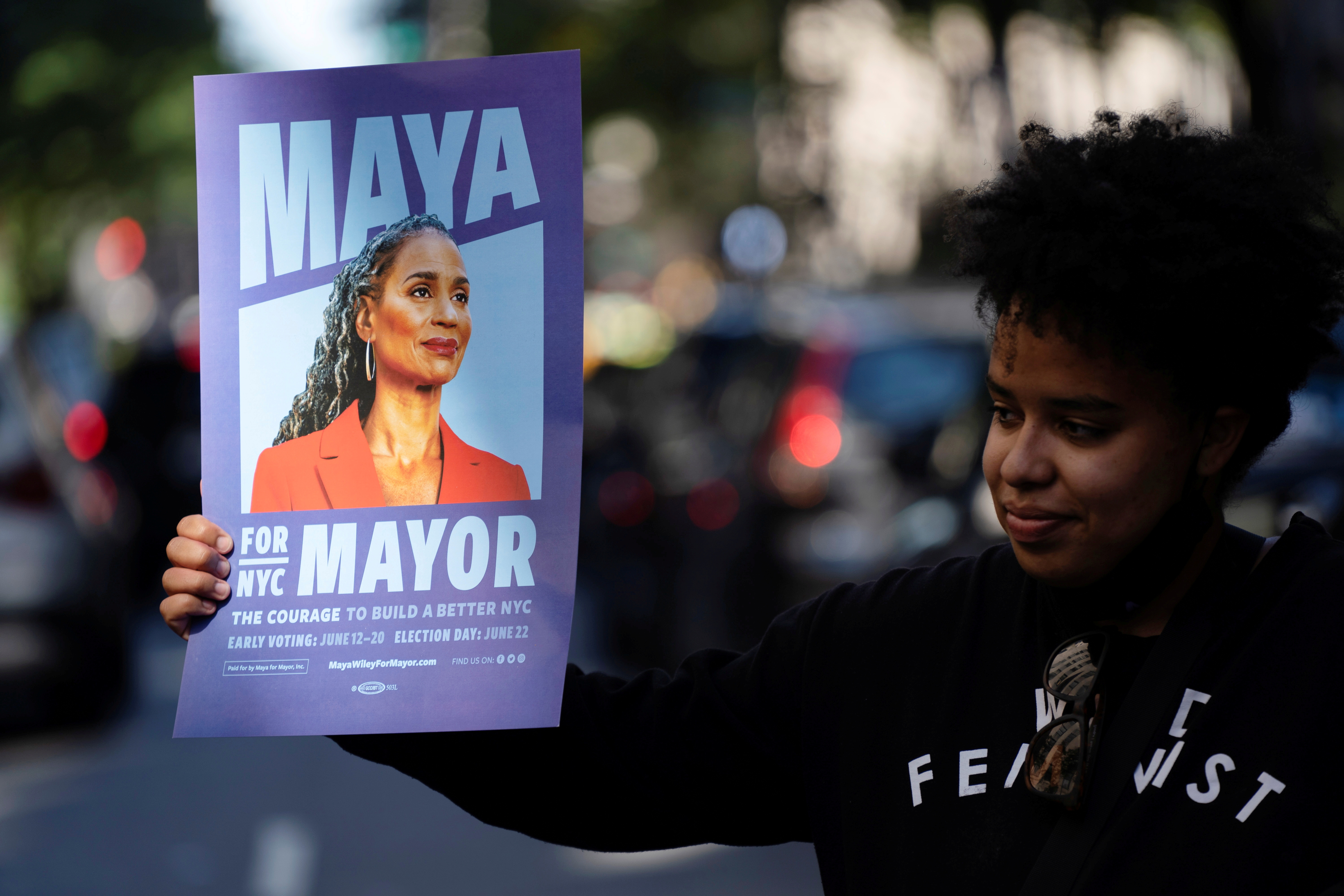 A supporter holds a sign for New York City Mayoral hopeful Maya Wiley at the Democratic primary debate in New York City