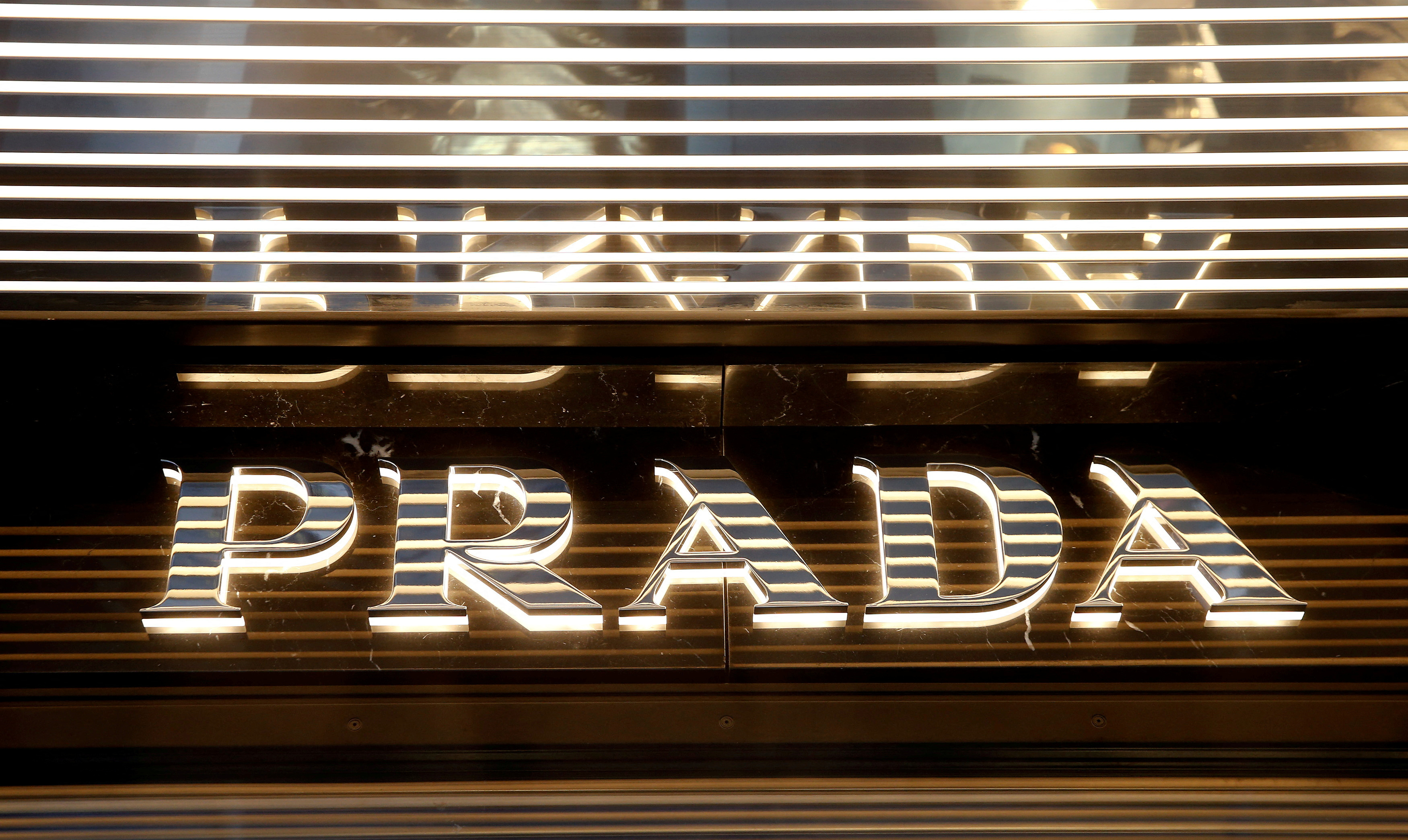FRANKFURT, GERMANY - Oktober 24, 2015: Prada Logo. Prada is an Italian  fashion label specializing in luxury goods for men and women, Stock image