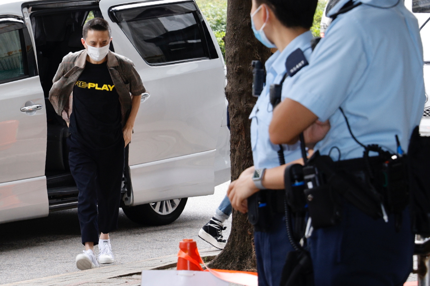 Hong Kong singer and prominent pro-democracy activist Anthony Wong Yiu-ming arrives at the Eastern Magistrates' Courts over a charge of 