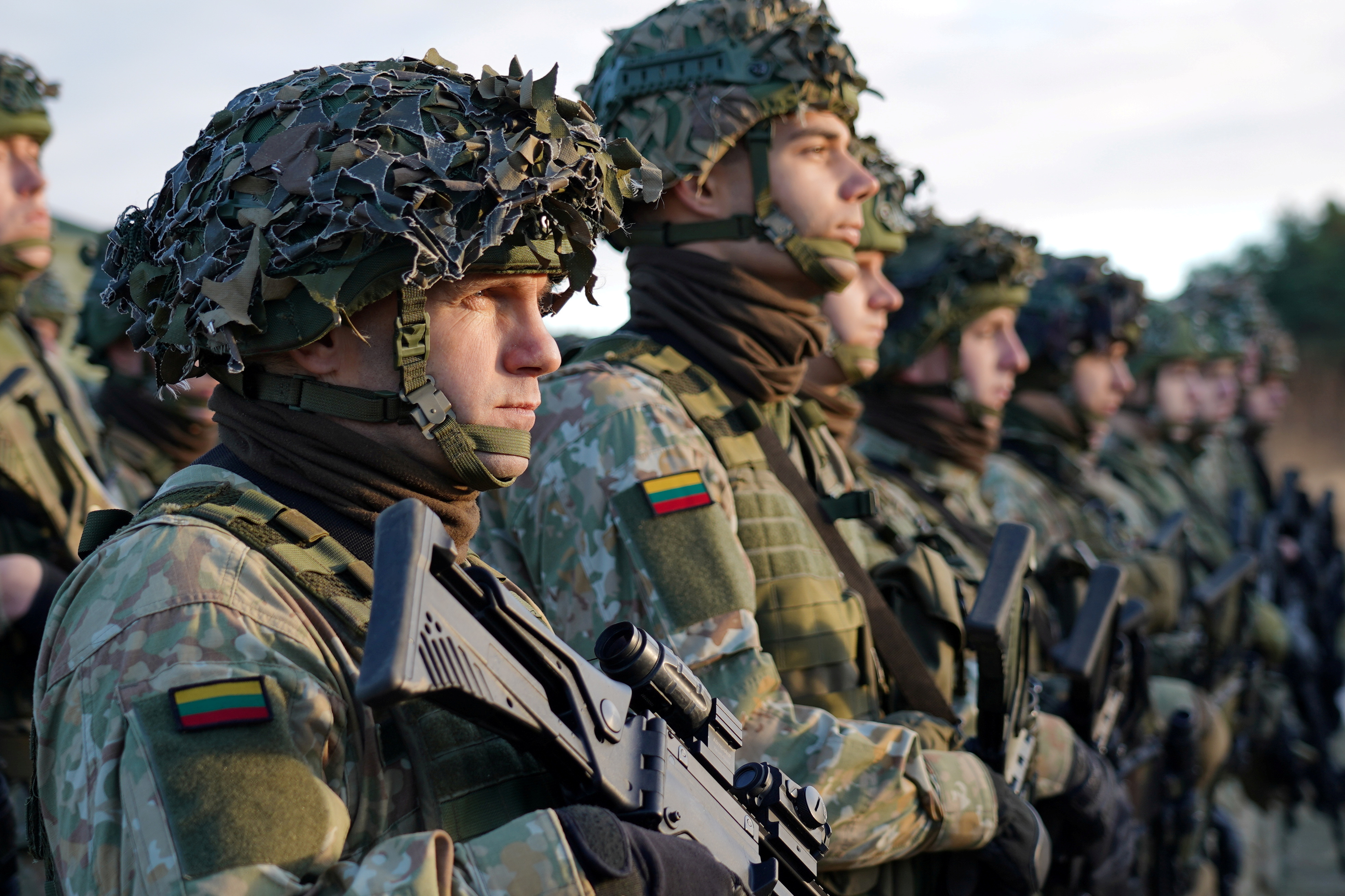 Servicemen of the Lithuanian Armed Forces look on during Lithuanian President Gitanas Nauseda's visit in Druskininkai, Lithuania November 22, 2021. REUTERS/Janis Laizans/File Photo