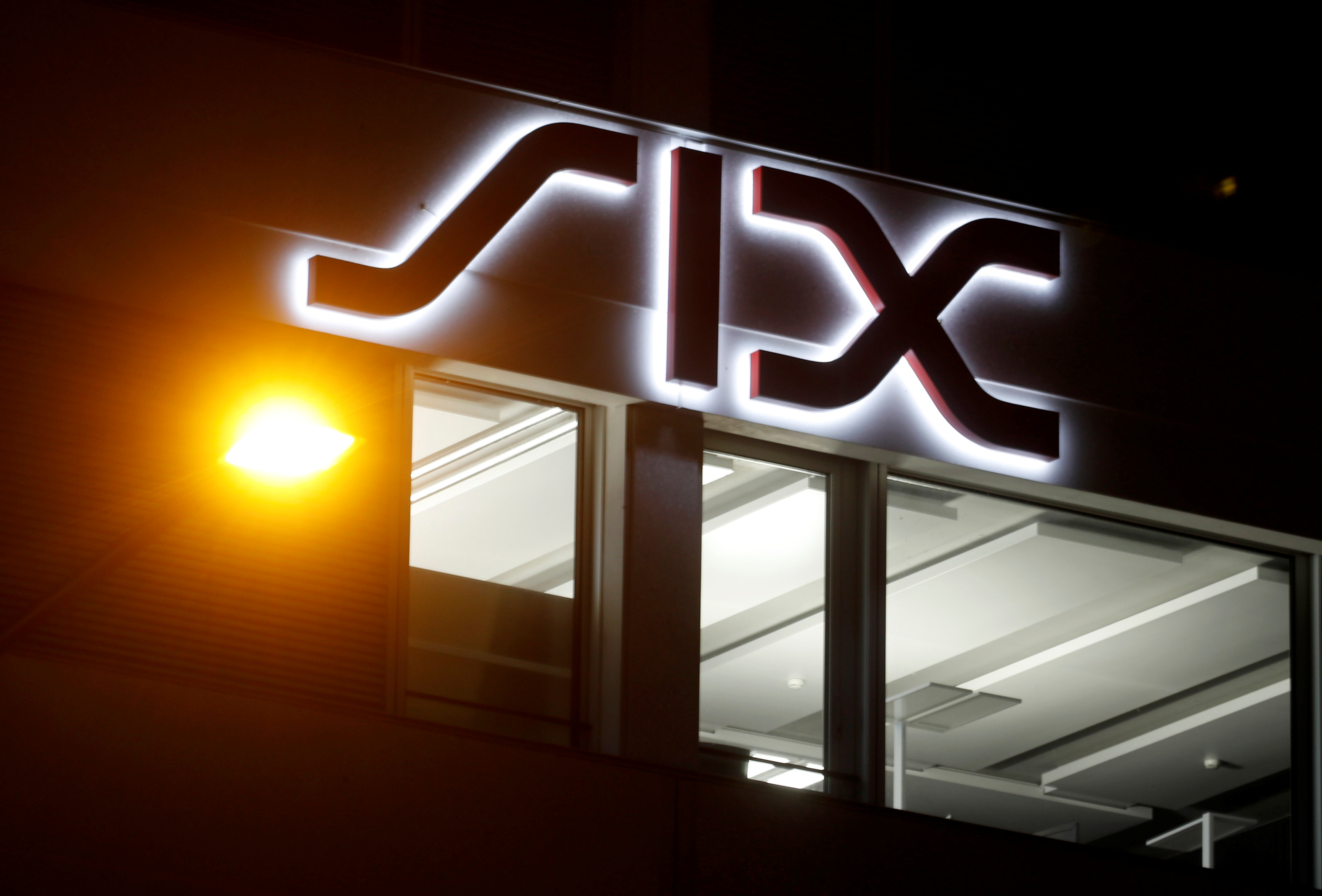 A logo is seen at the seat of Swiss stock exchange operator SIX Group in Zurich
