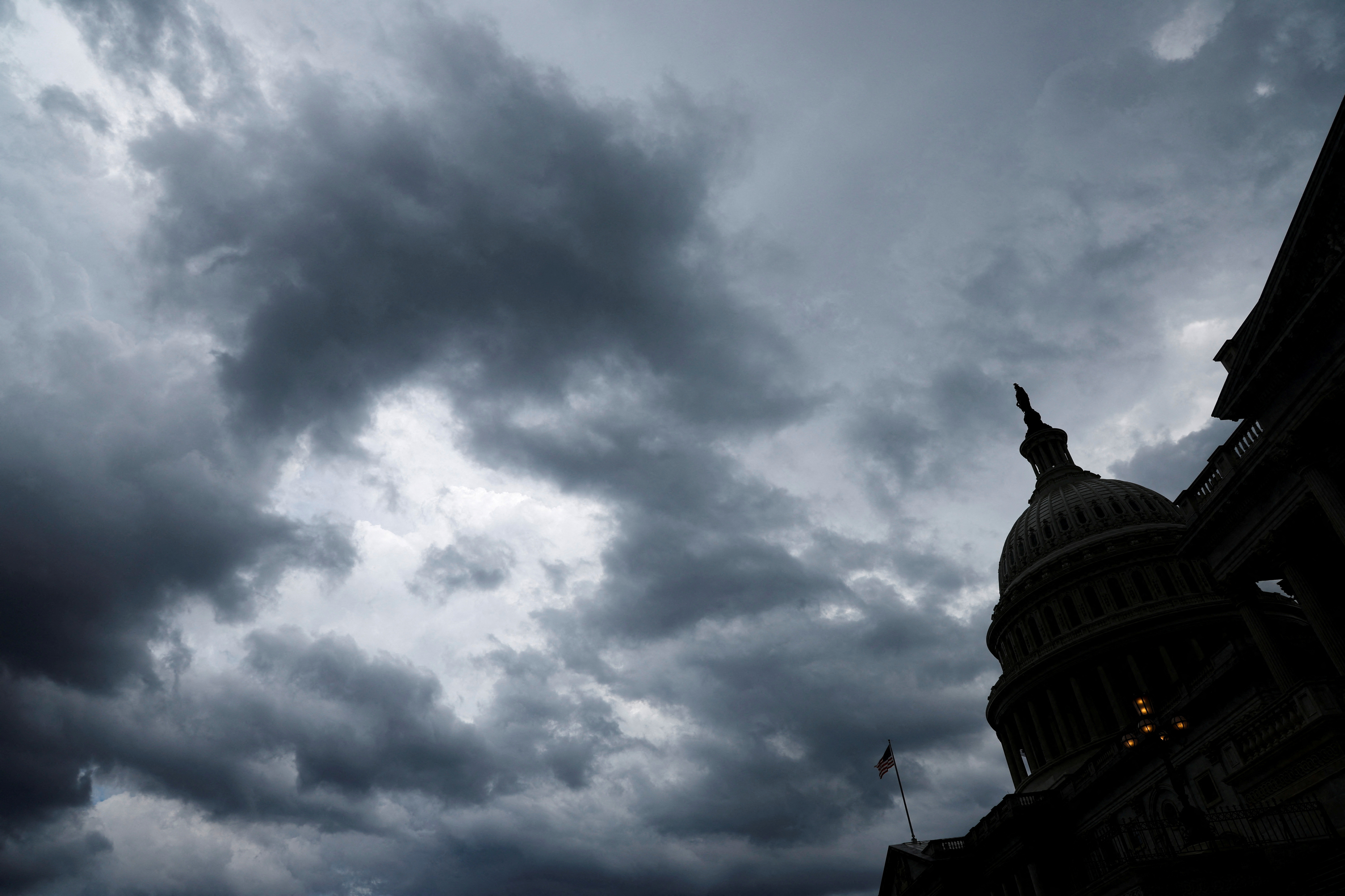 Storm clouds pass over the U.S. Capitol in Washington