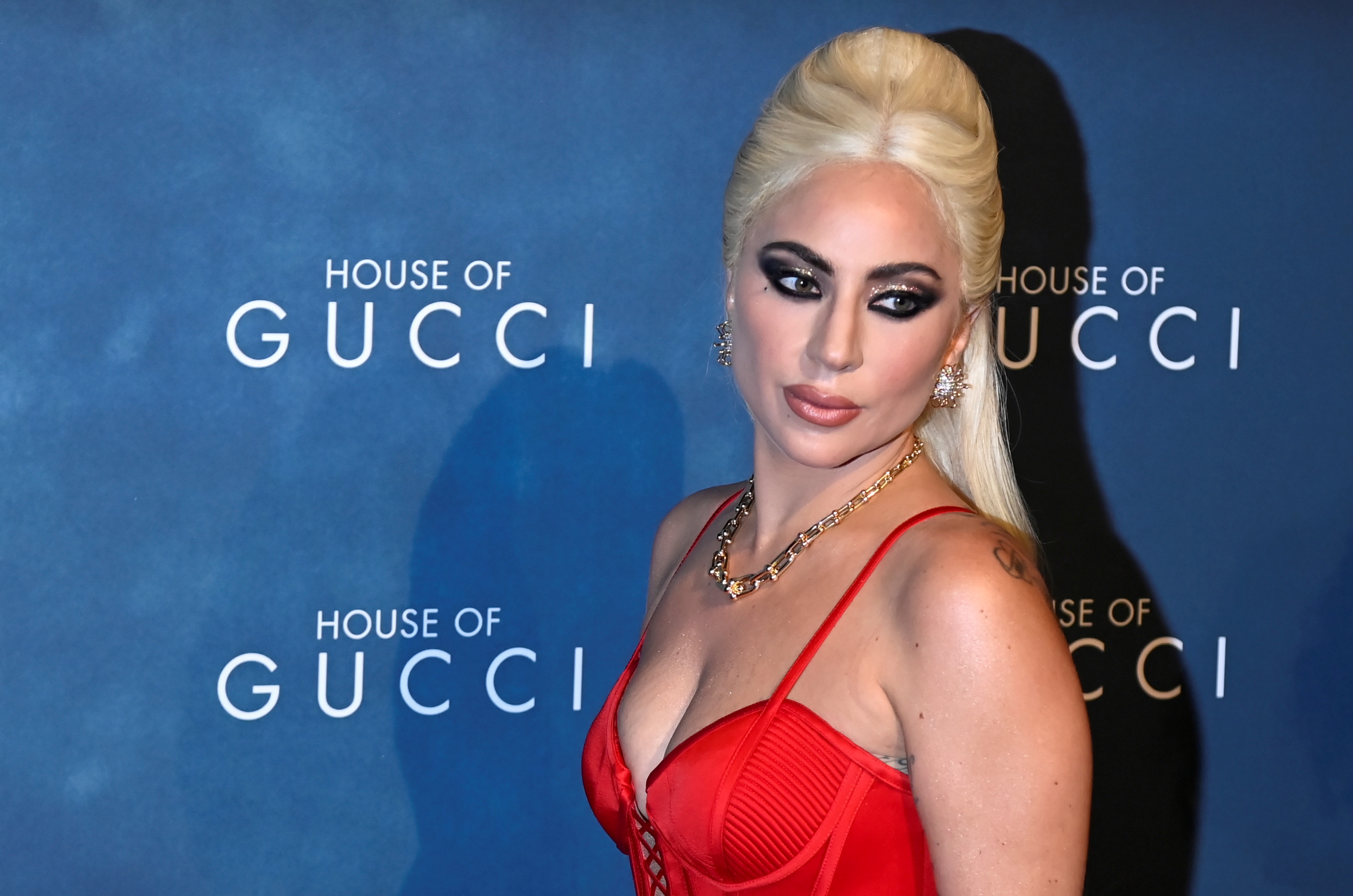Cast member Lady Gaga poses for a photo as she arrives at the Italian Premiere of the film 'House of Gucci' at the Space Cinema Odeon in Milan, Italy, November 13, 2021. REUTERS/Flavio Lo Scalzo/File Photo