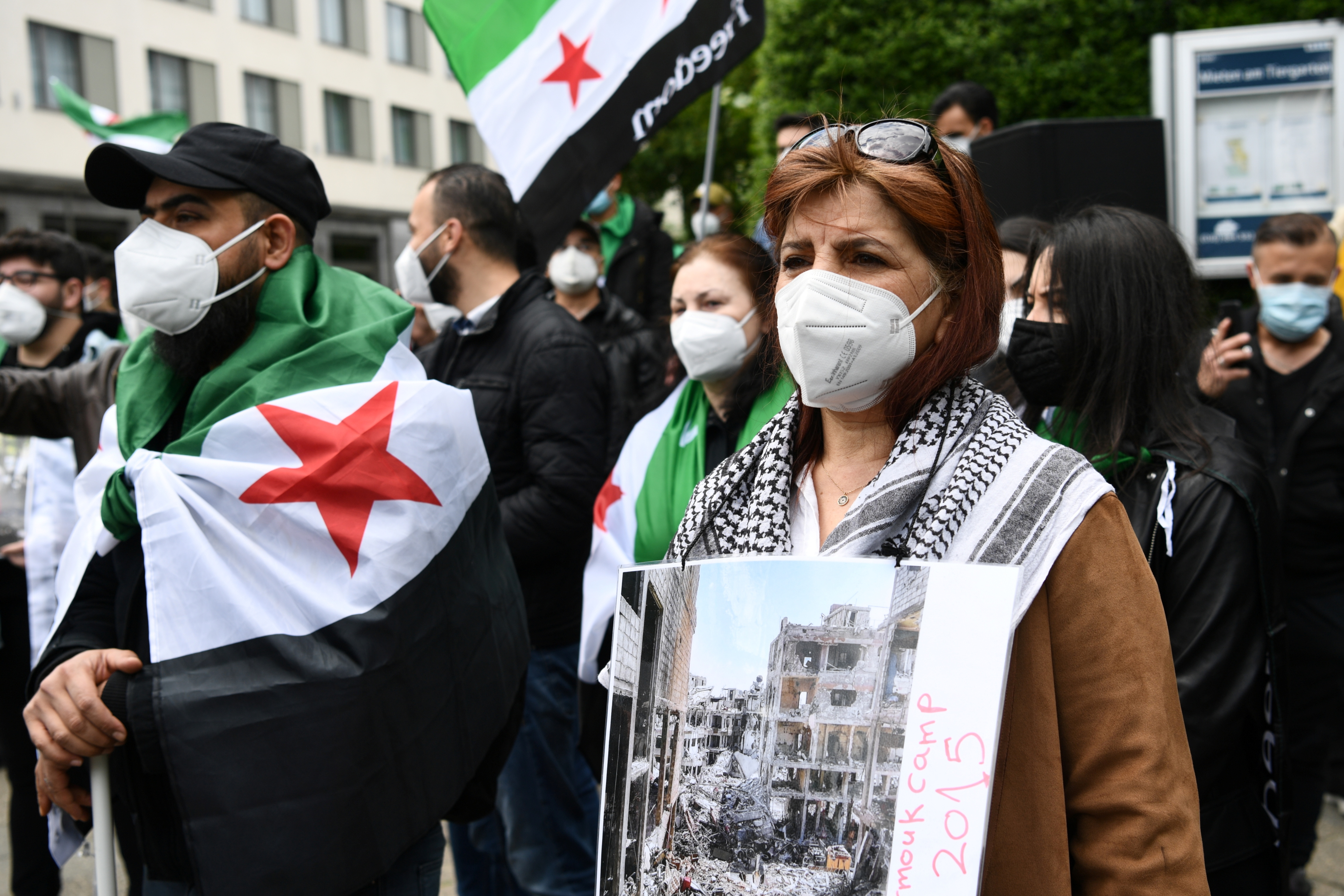 People protest against Assad re-election in Berlin