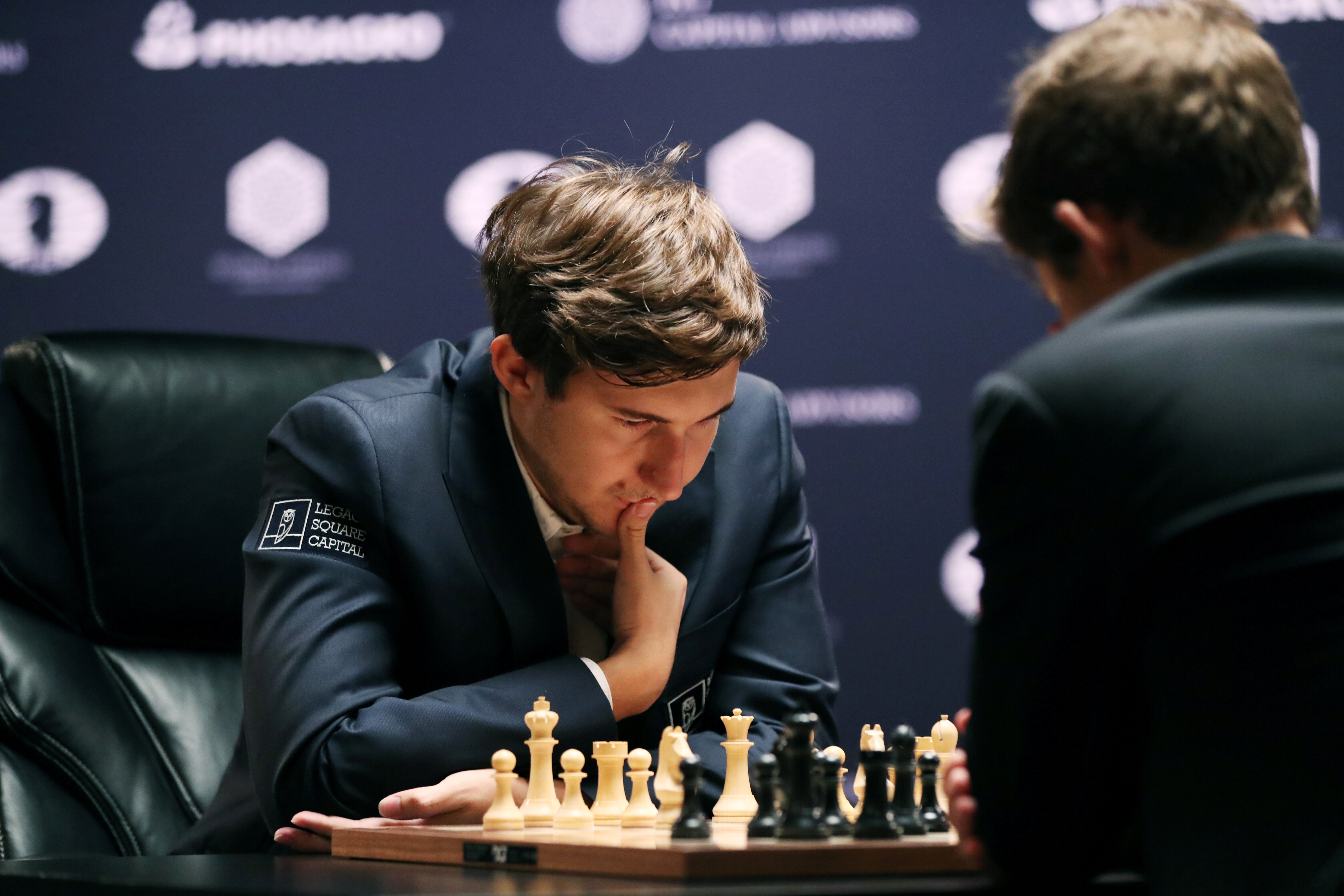 International Chess Federation on X: Magnus Carlsen takes down