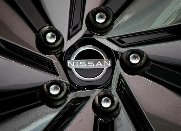 The Nissan brand logo of is seen on a wheel