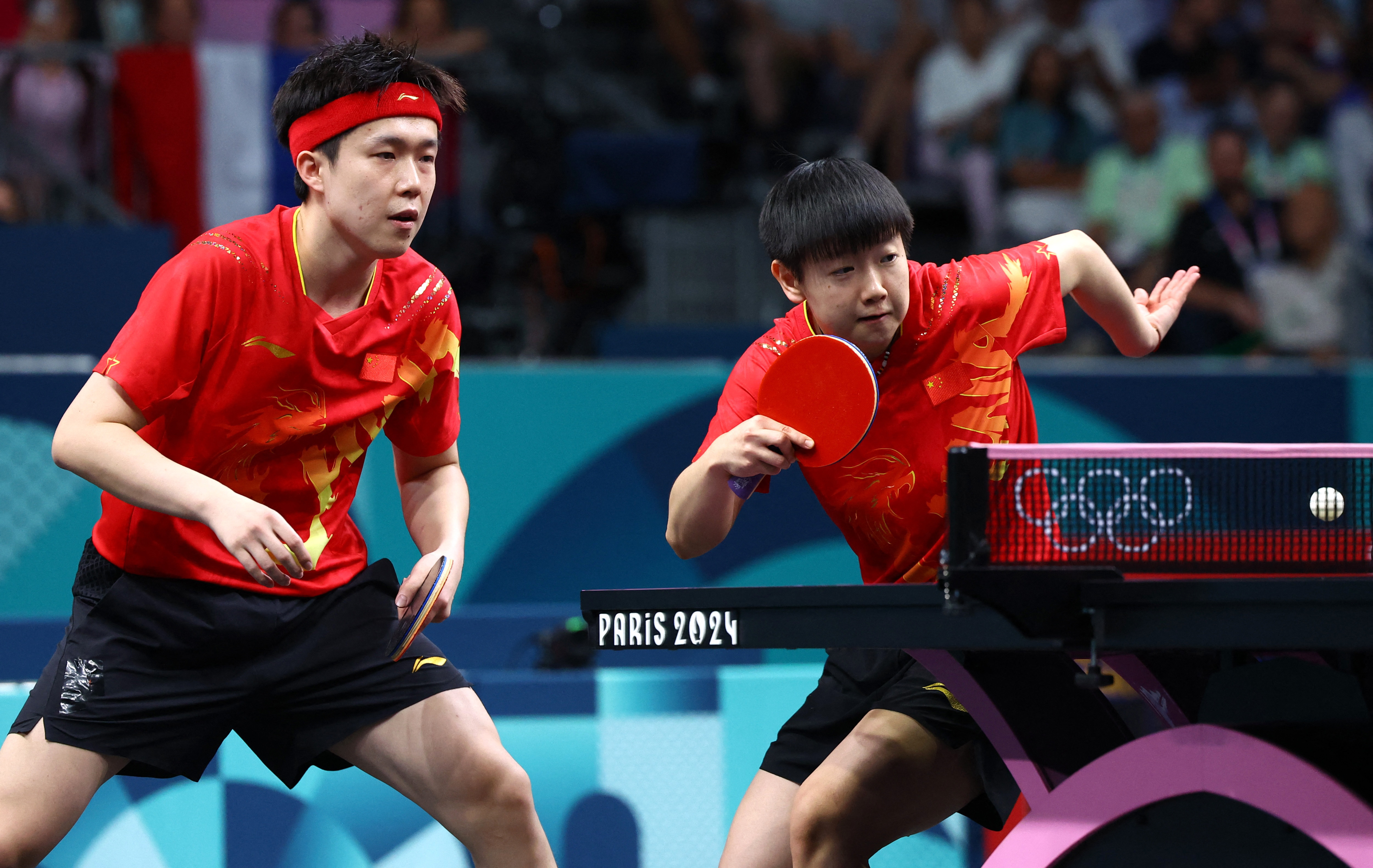 Table Tennis: China bags three wins in a day, French Lebrun brothers  advance in singles | Reuters